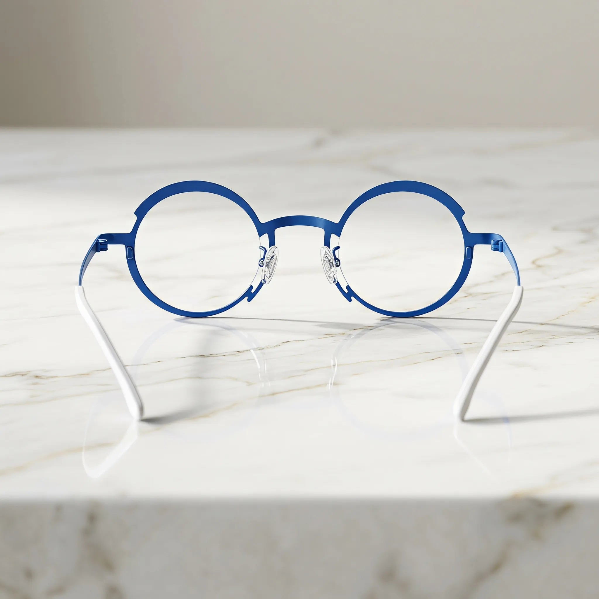 Barledear Ocean Blue Sunshine Yellow eyeglasses back view showing the round full-rim frame structure, nose pads, temples, and color-block details