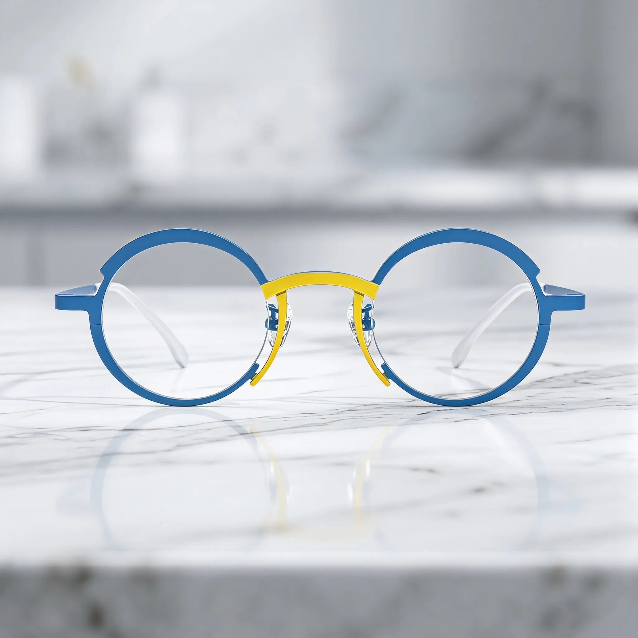Barledear Ocean Blue Sunshine Yellow eyeglasses lifestyle front view showing the artistic round titanium frame and contrasting color details