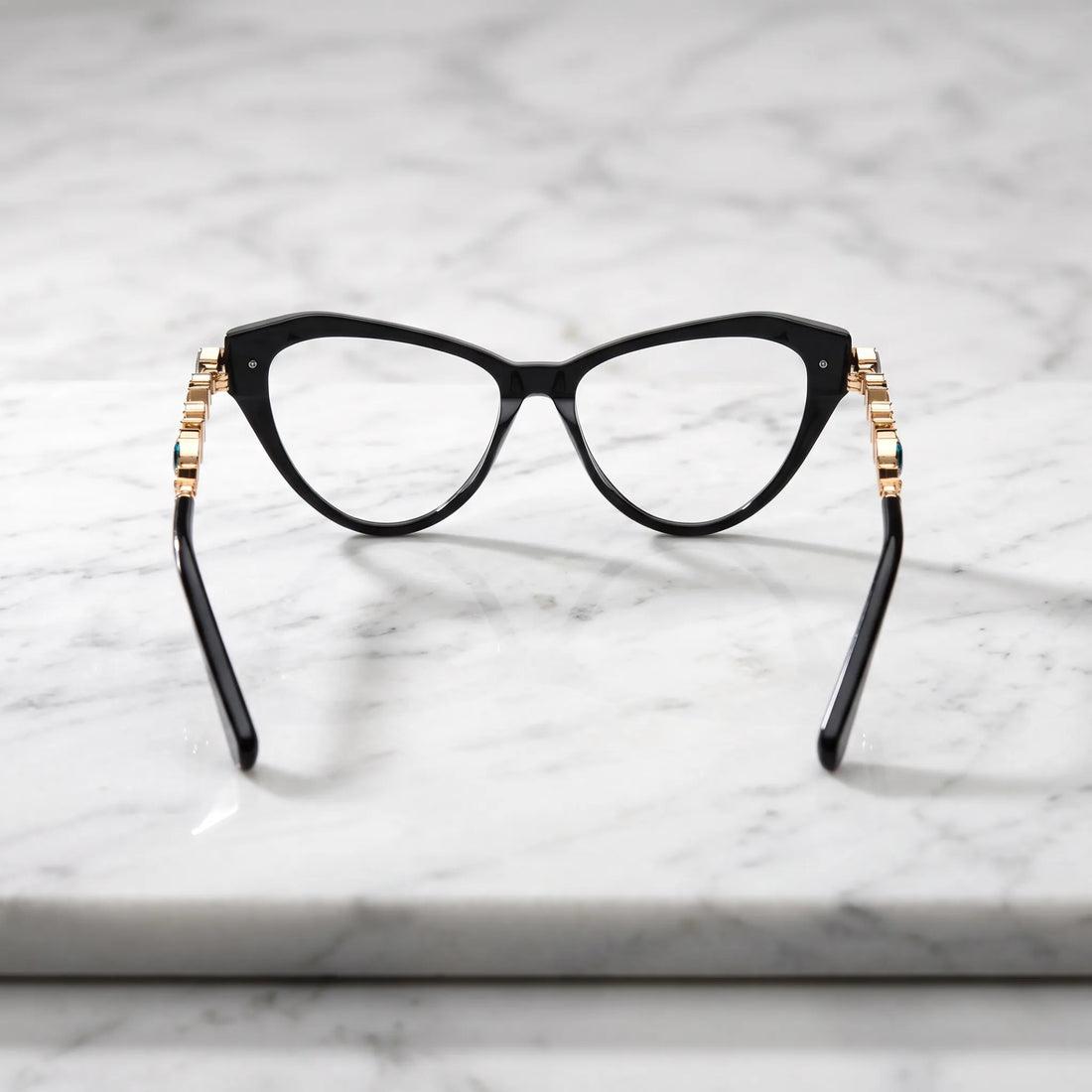 Barledear Onyx Black eyeglasses back view showing the full-rim cat-eye structure, molded nose pads, and smooth black acetate temple tips