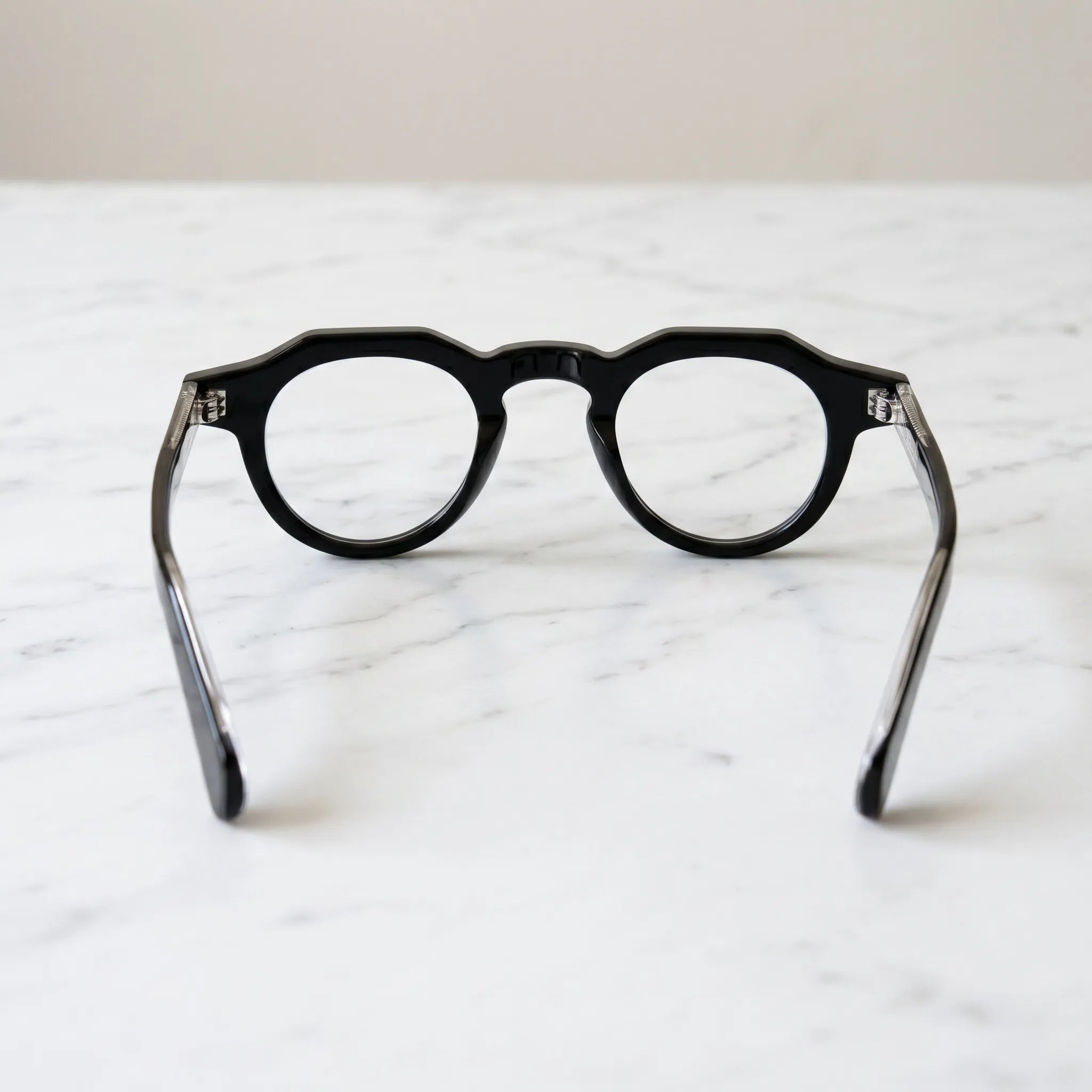 Barledear Onyx Black retro geometric acetate eyeglasses showing the full-rim structure, integrated nose pads, and curved temple tips