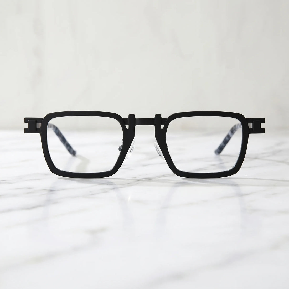Barledear Onyx Smoke Marble eyeglasses shown in a clean lifestyle front view with black square frame and smoke marble temple detail