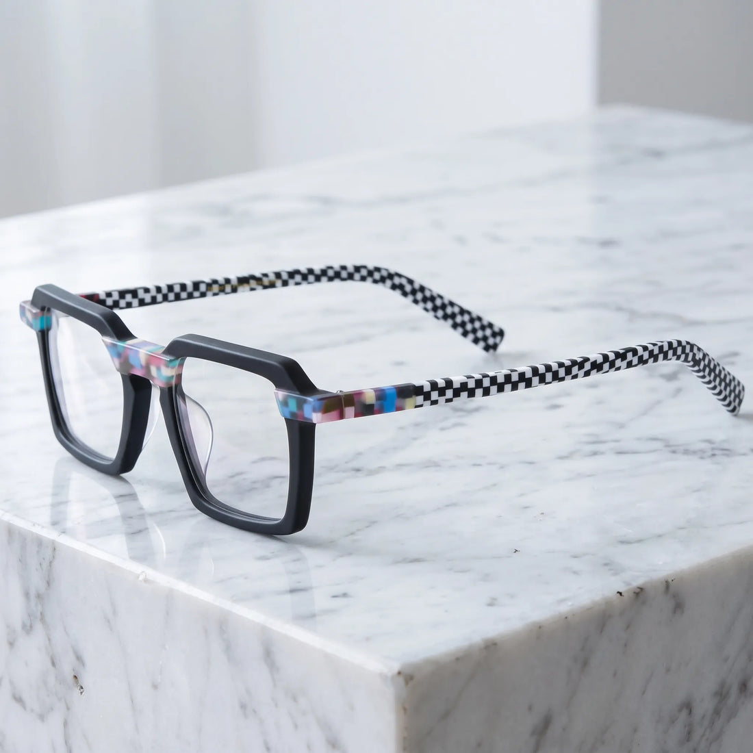 Barledear Pixel Checker Noir square eyeglasses angled side view showing colorful pixel accents and checkerboard temples