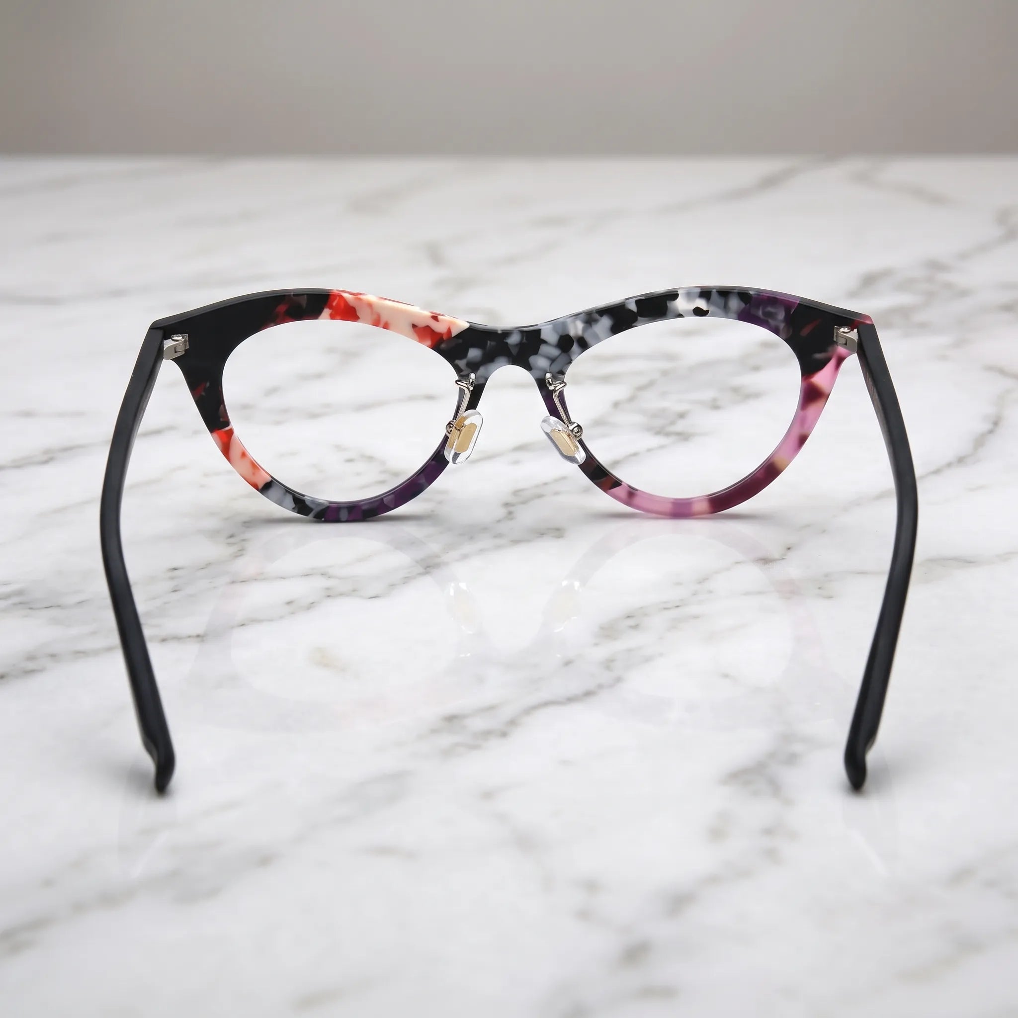 Barledear Plum Ember Mosaic cat-eye eyeglasses back view showing the full-rim frame, adjustable nose pads, and black temples