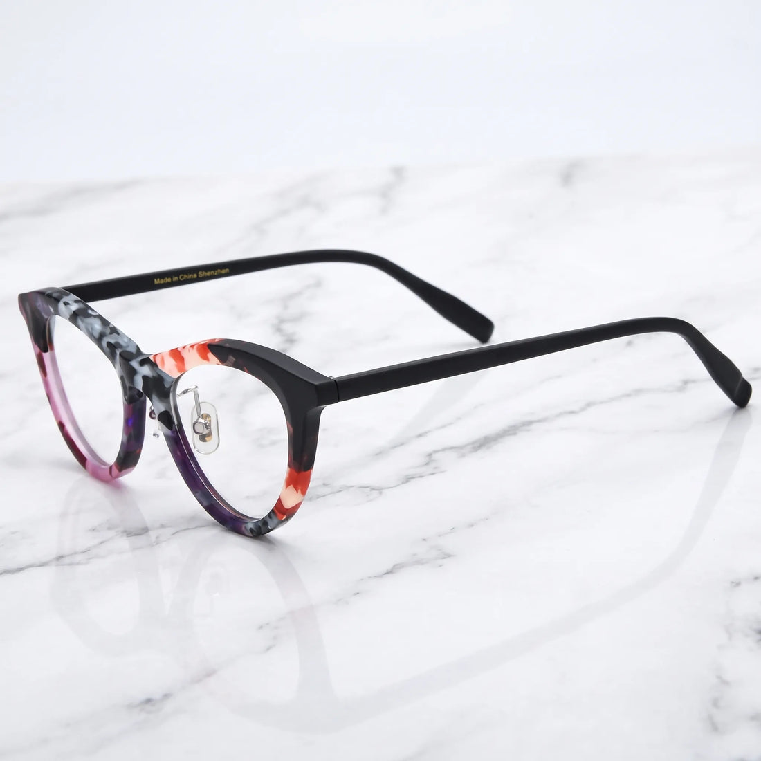 Barledear Plum Ember Mosaic cat-eye acetate eyeglasses angled side view showing the patterned frame front and slim black temples