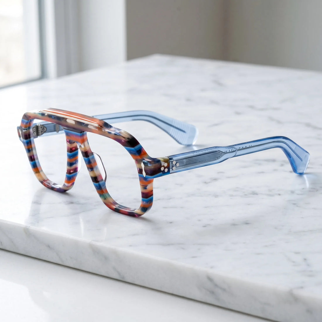 Barledear Prism Blue Mosaic eyeglasses angled side view showing translucent blue temples, silver-tone temple inlays and metal screw hinges