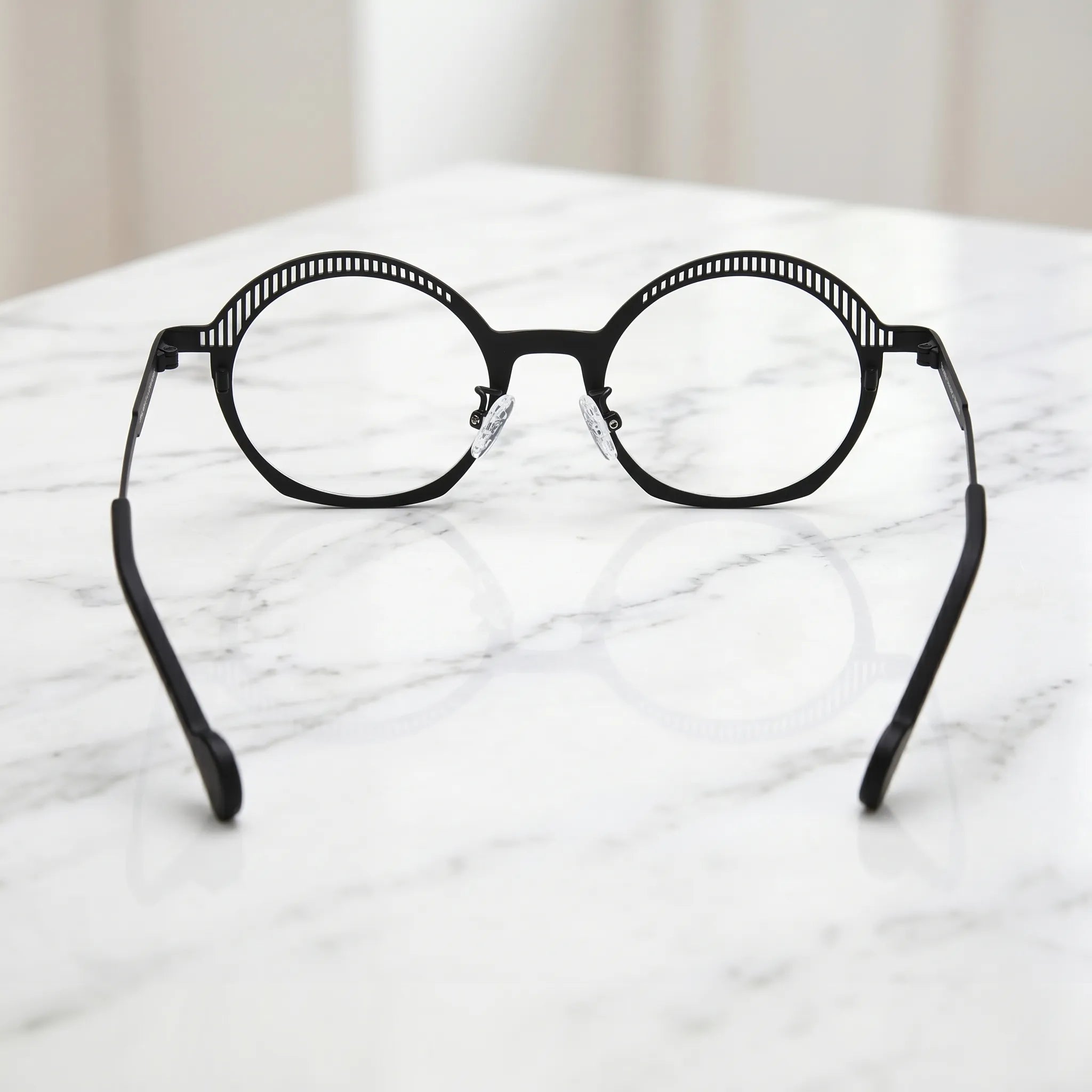 Barledear Prism Noir eyeglasses back view showing adjustable nose pads, slim temple structure, and prescription-ready full-rim construction