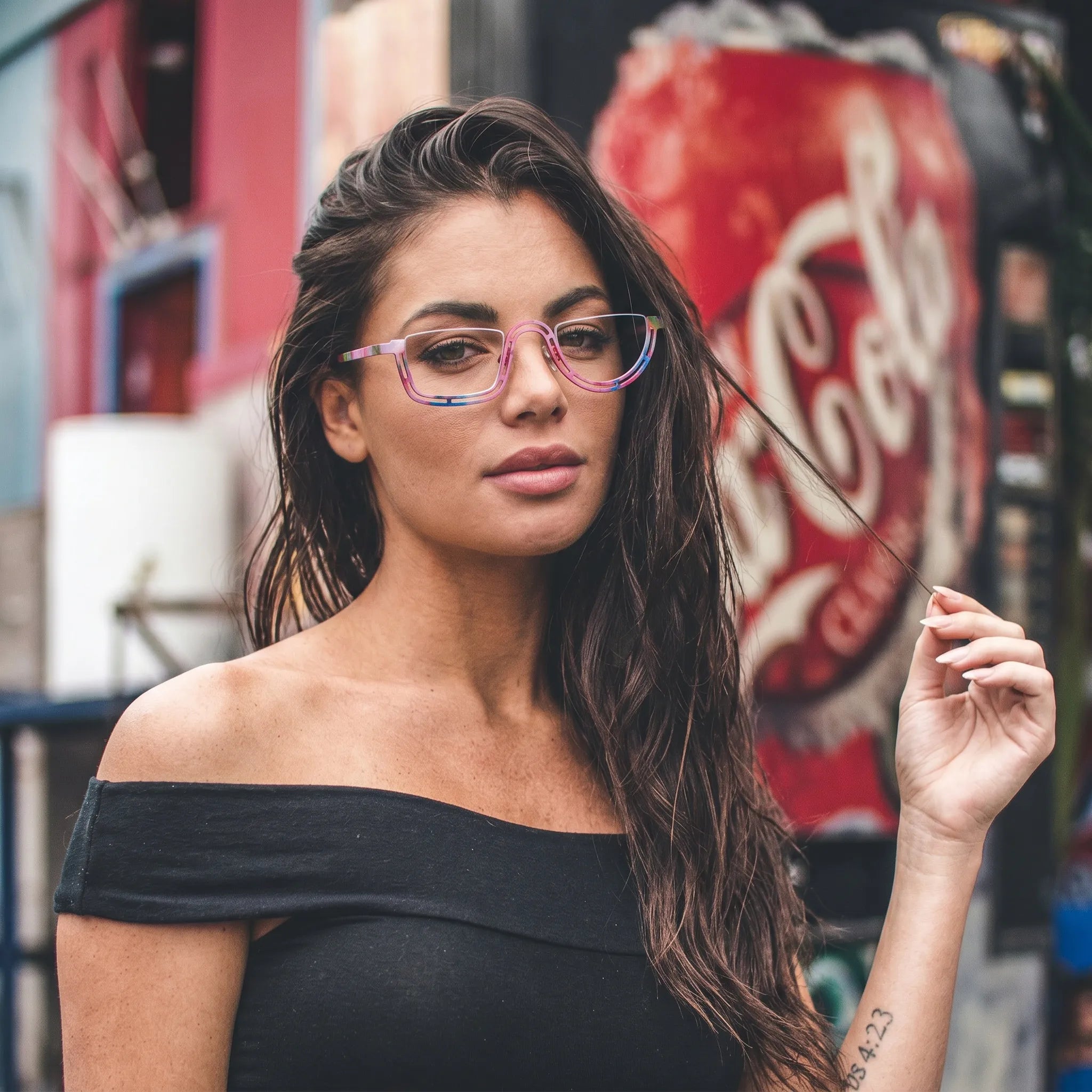 Model wearing Barledear Rose Mosaic Pink eyeglasses in a lifestyle portrait