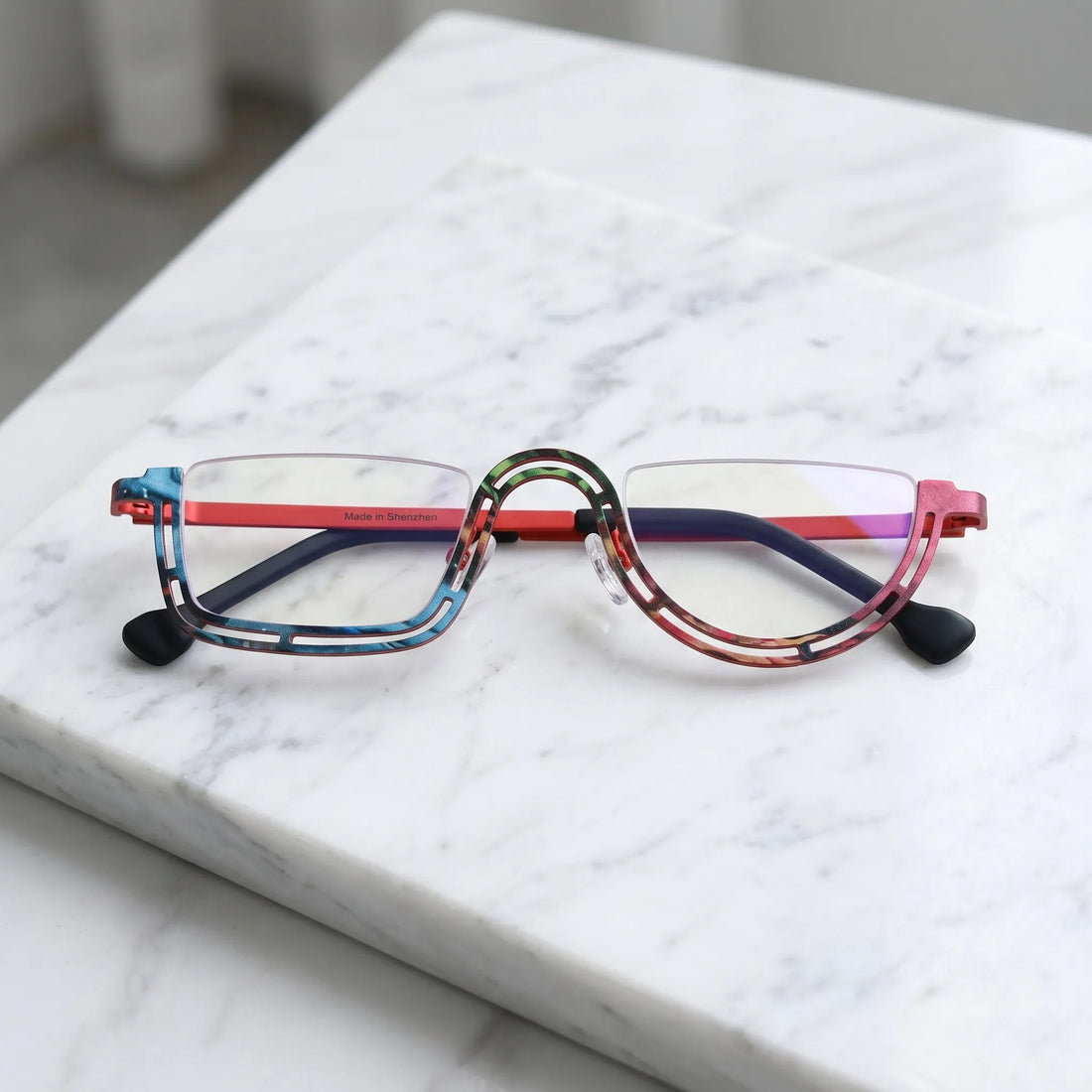 Barledear Scarlet Mosaic Red eyeglasses folded display showing slim temples and artistic frame design