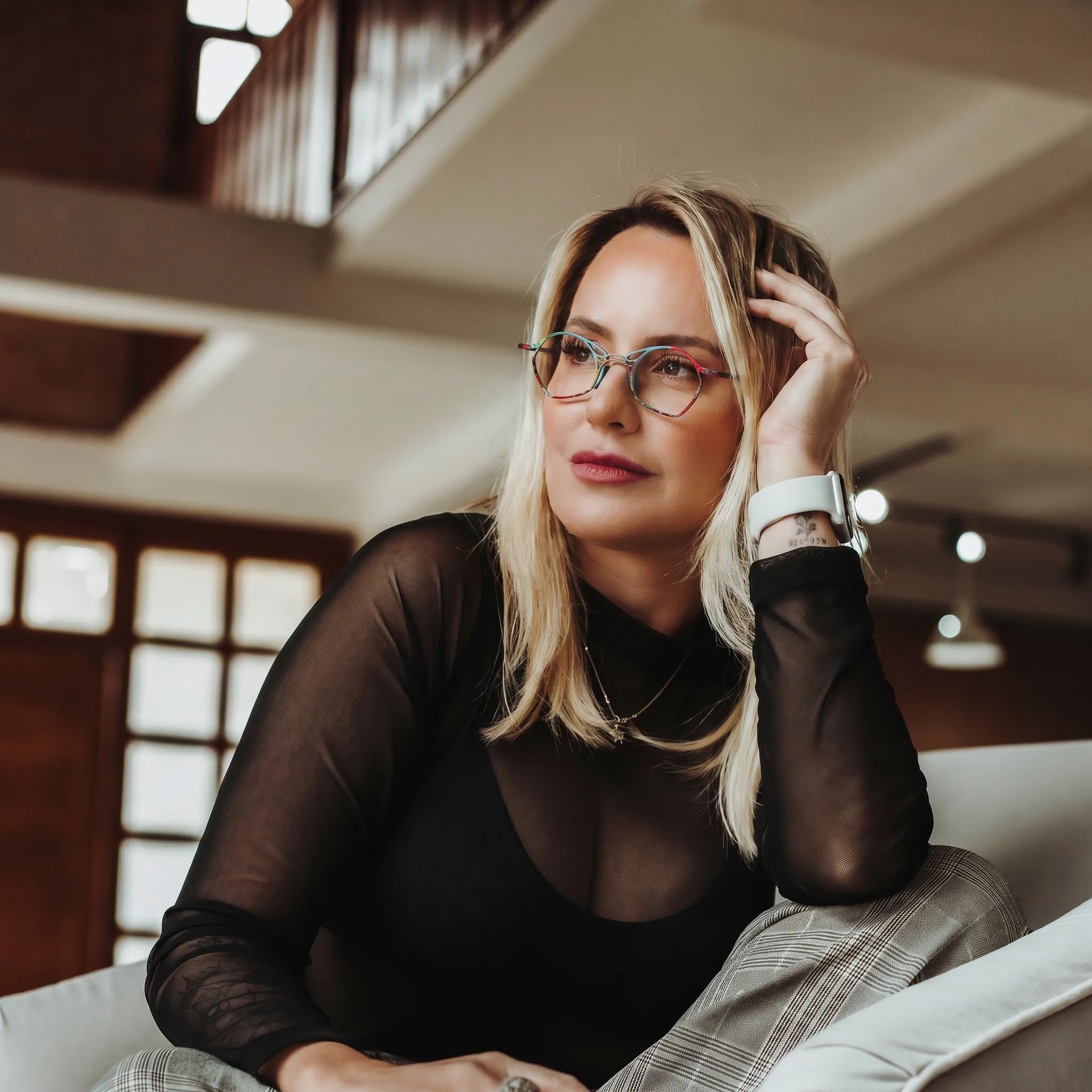 Model wearing Barledear Skyline Patchwork Blue eyeglasses in a lifestyle portrait