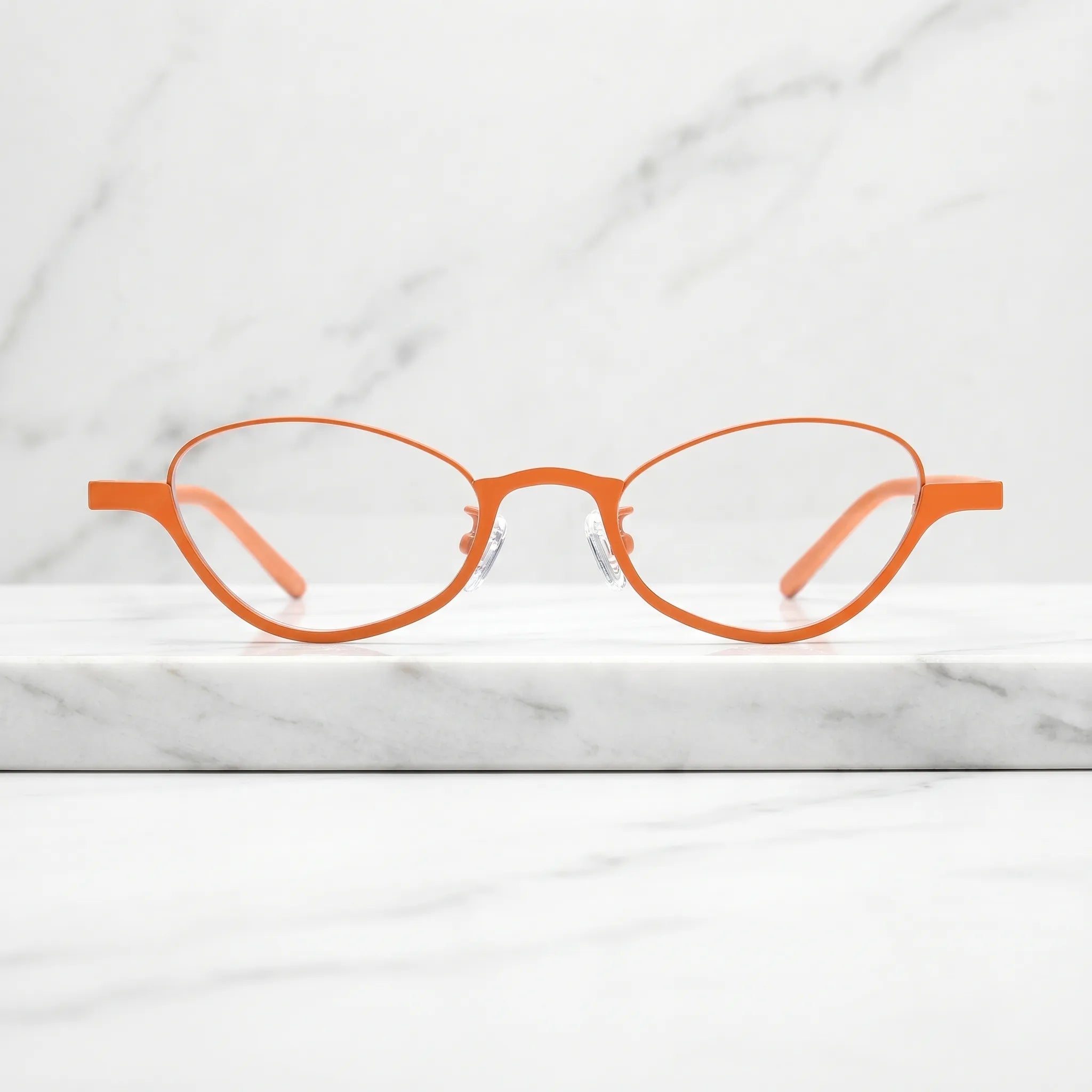 Barledear Tangerine Bloom eyeglasses shown in a clean lifestyle front view with warm orange oval frame