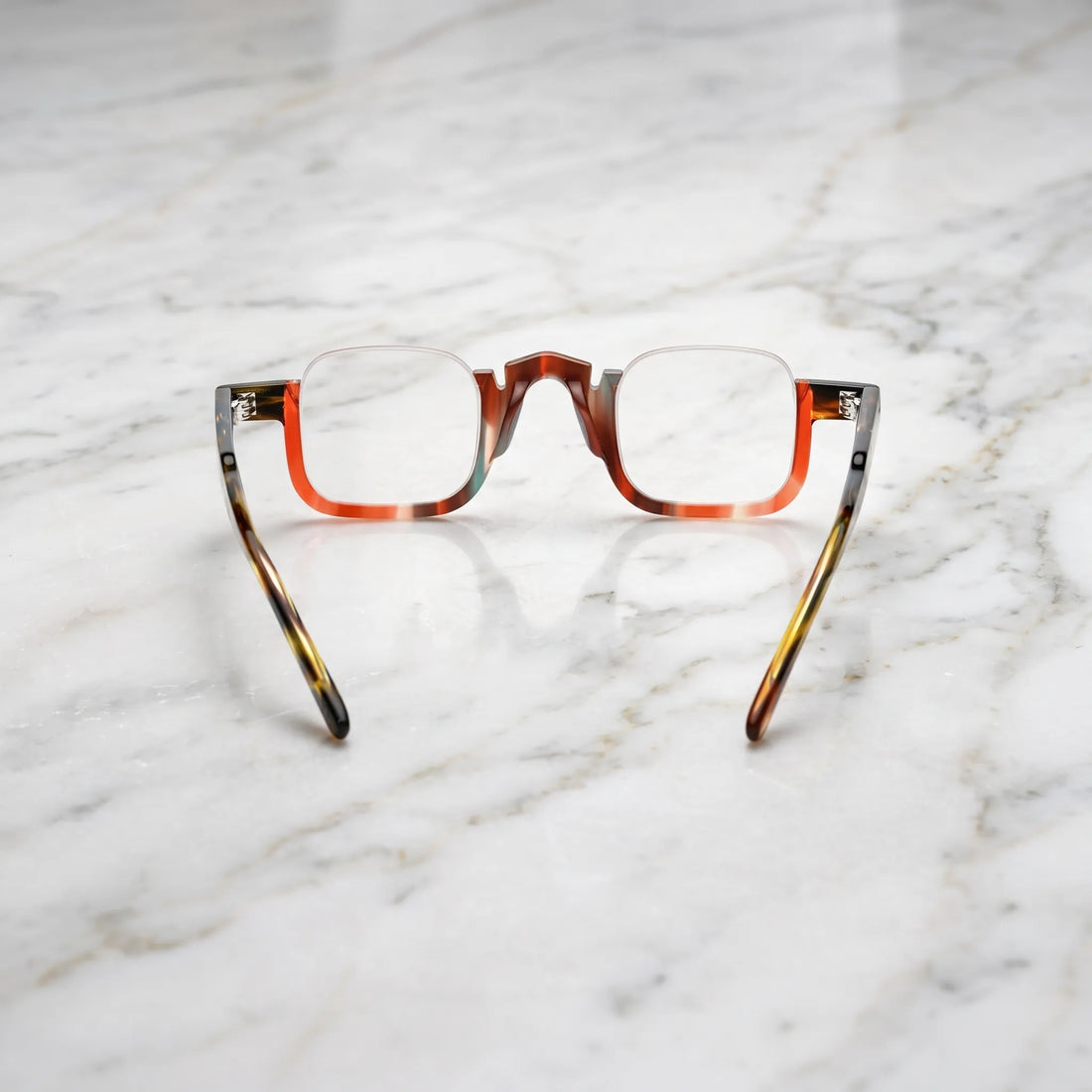 Back view of  VL19352 Crystal Blue Tortoise square eyeglasses showing the semi-rimless frame construction, integrated nose bridge and acetate temples
