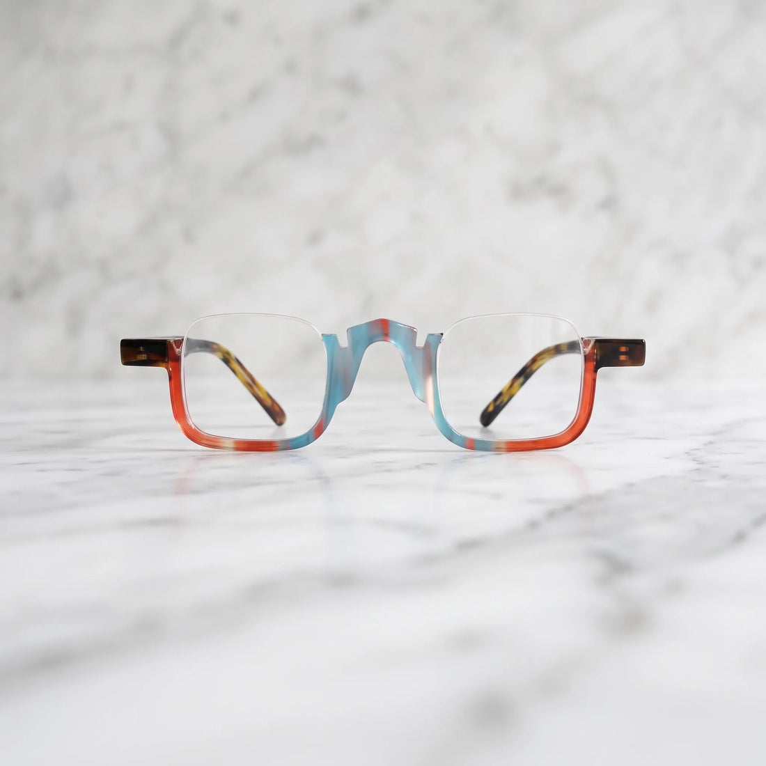 Front view of  VL19352 Crystal Blue Tortoise semi-rimless square eyeglasses featuring colorful acetate details and a modern prescription-ready optical frame