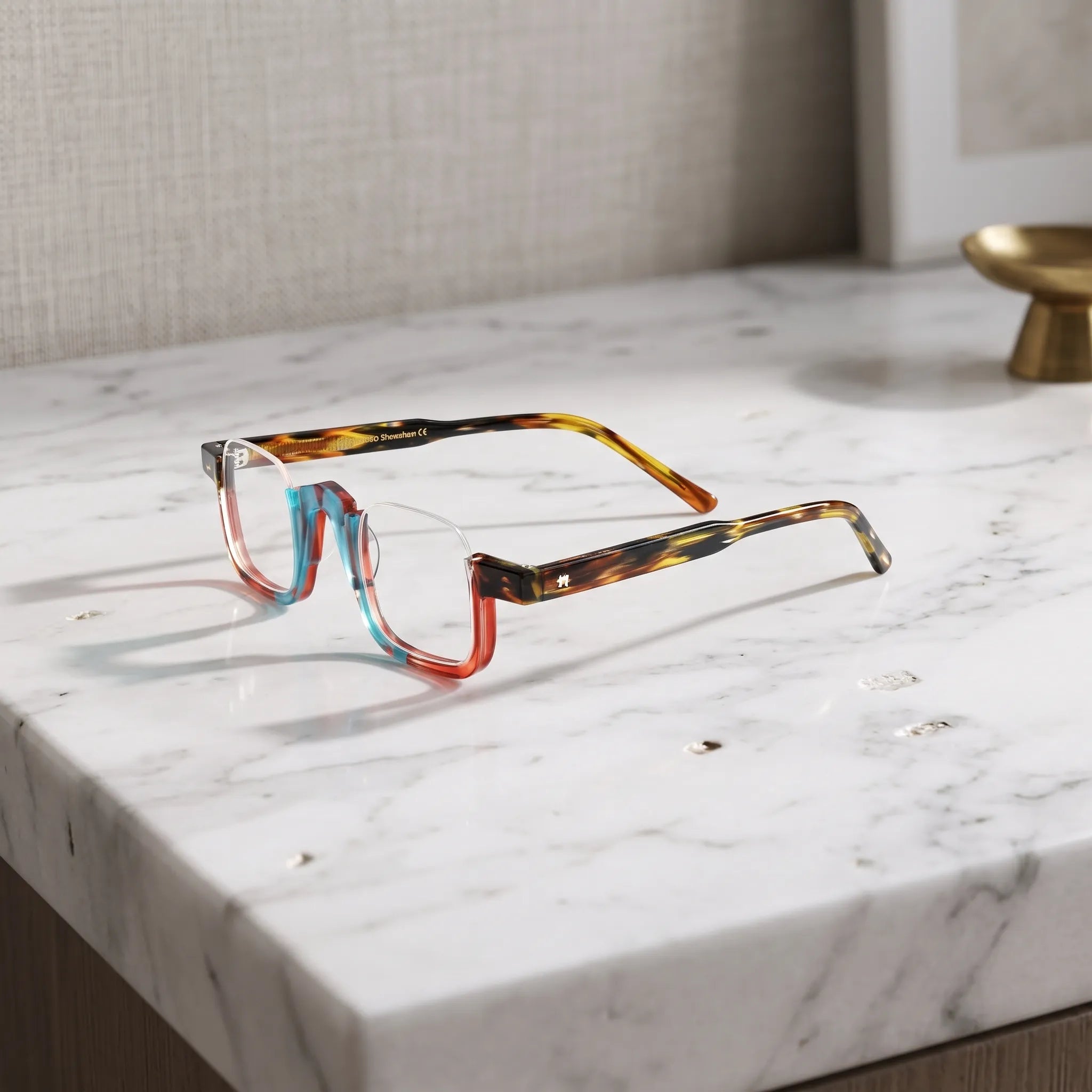 Side view of  VL19352 Crystal Blue Tortoise square glasses highlighting the colorful acetate frame, patterned temples and semi-rimless optical design