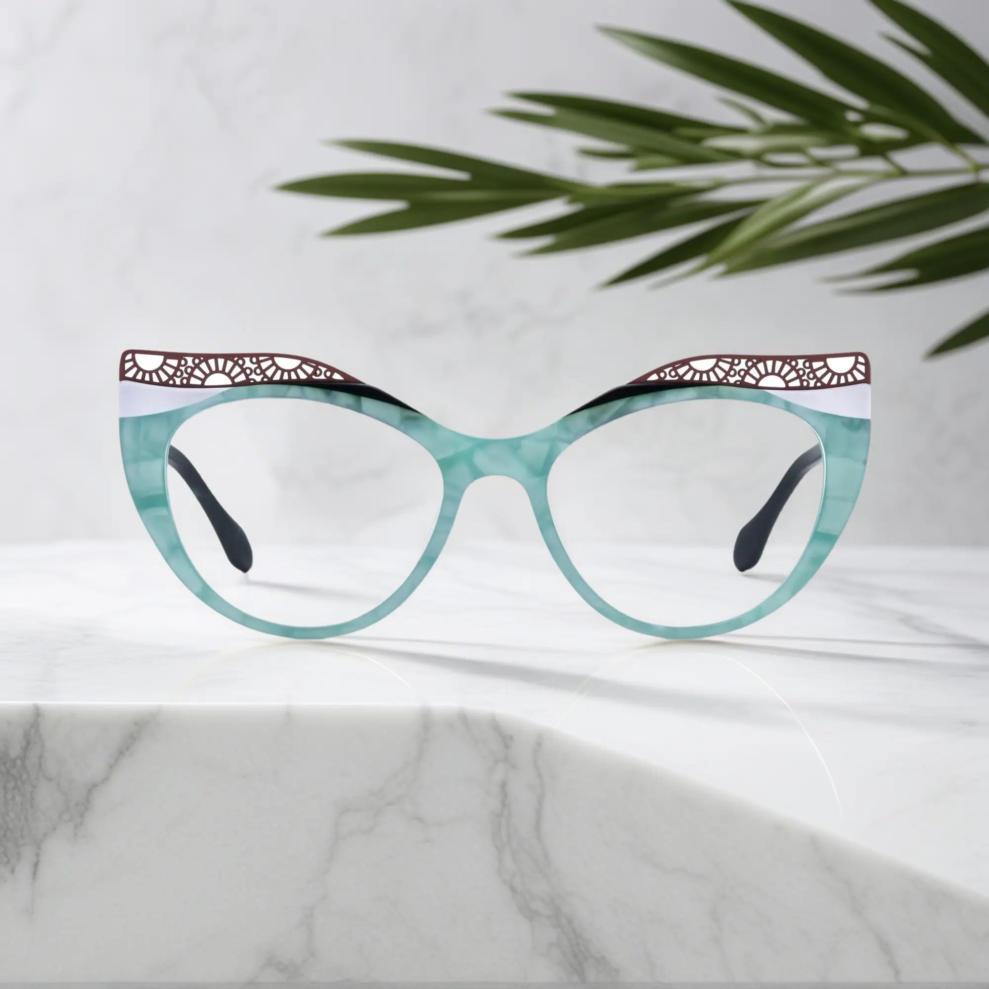 Front View of VoyueLens™ Aqua Frost cat-eye eyeglasses with blue-green gradient and signature lace-pattern design.