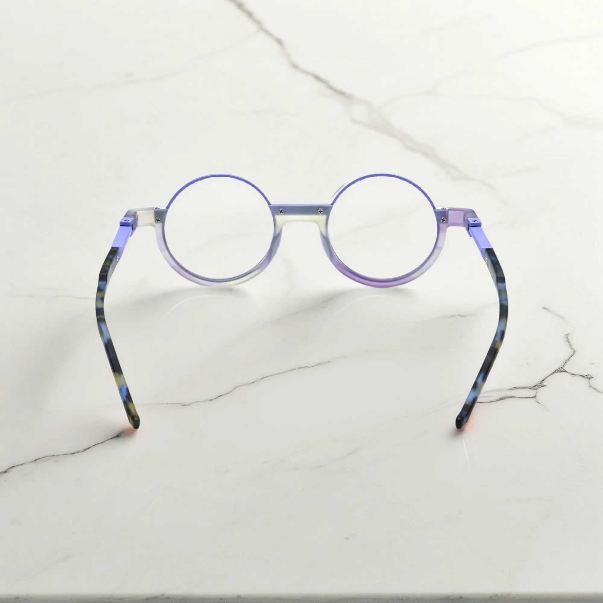 Back angle showing the high-transparency purple hue and layered frame design of Aurora Fade eyeglasses.