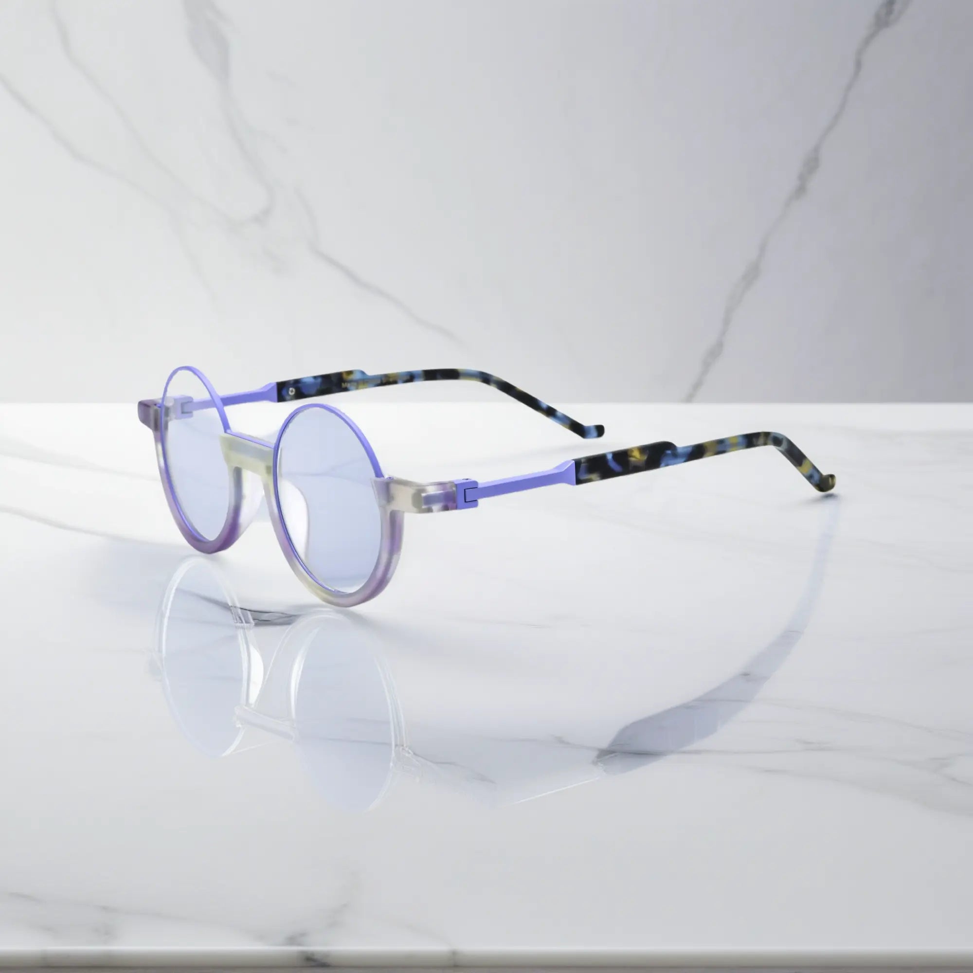 Side view highlighting the purple acetate frame and slender arms of Aurora Fade round eyeglasses by VoyueLens™.