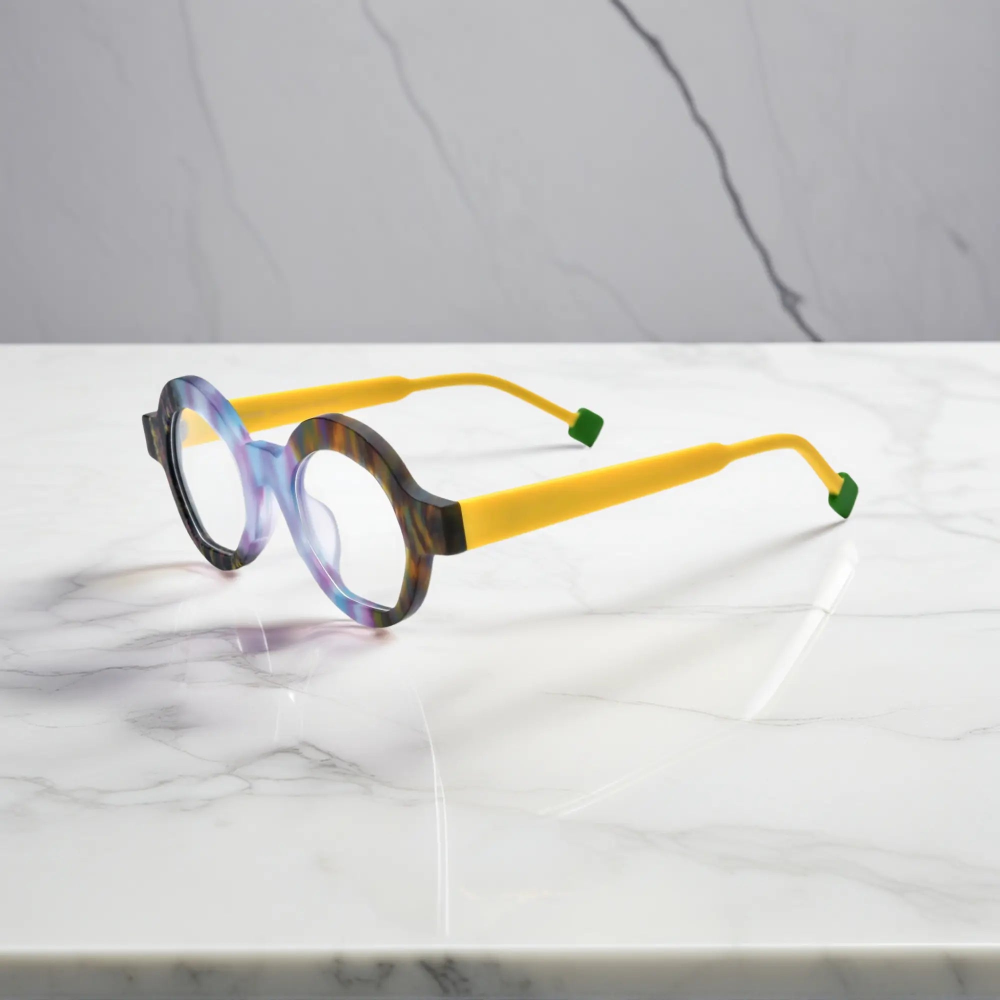 Side view of Aurora Fade frame with soft yellow matte temples, artistic design and ultra-lightweight acetate