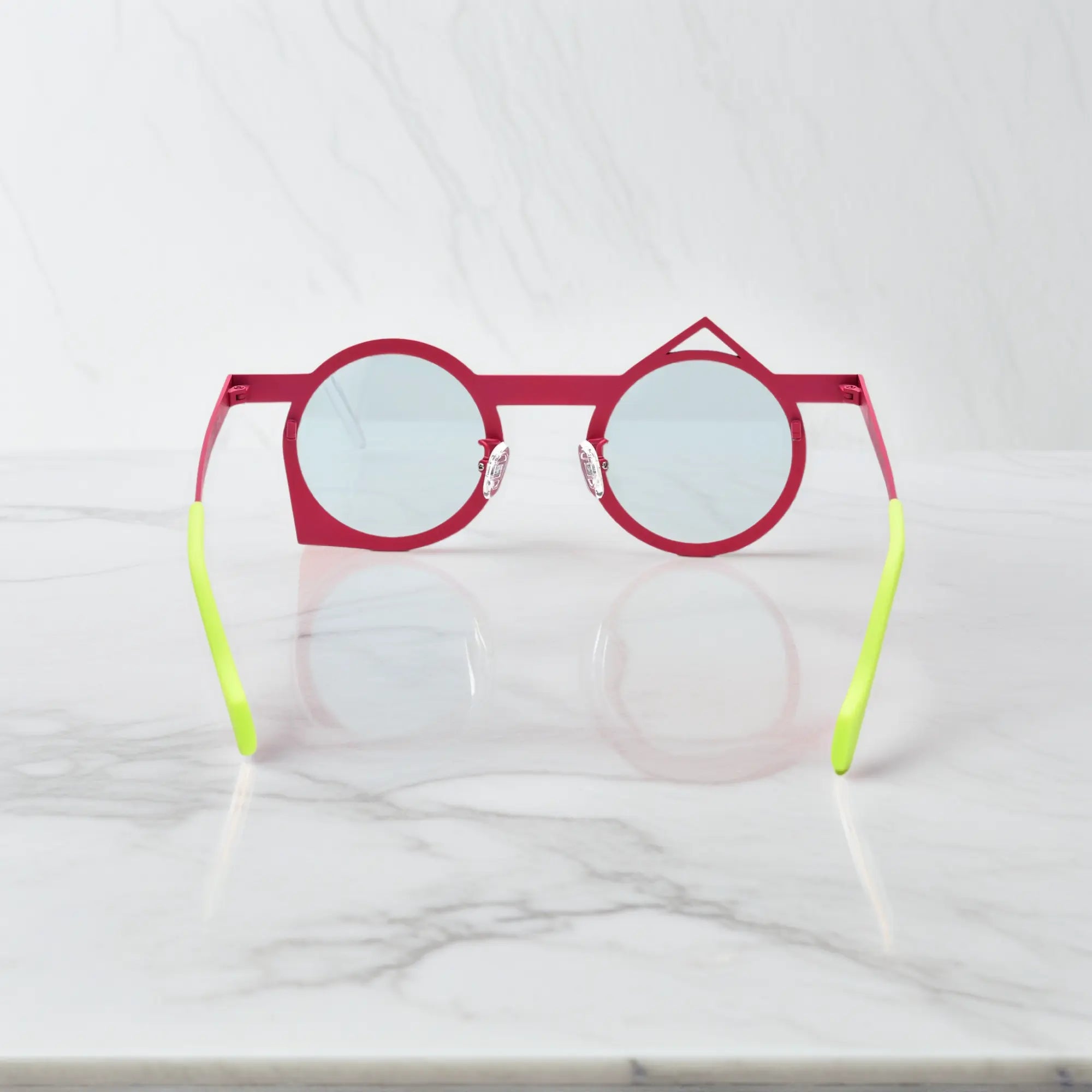 Rear display of VoyueLens™ VL185801 Berry Sky lightweight titanium frame in dual pastel tones.