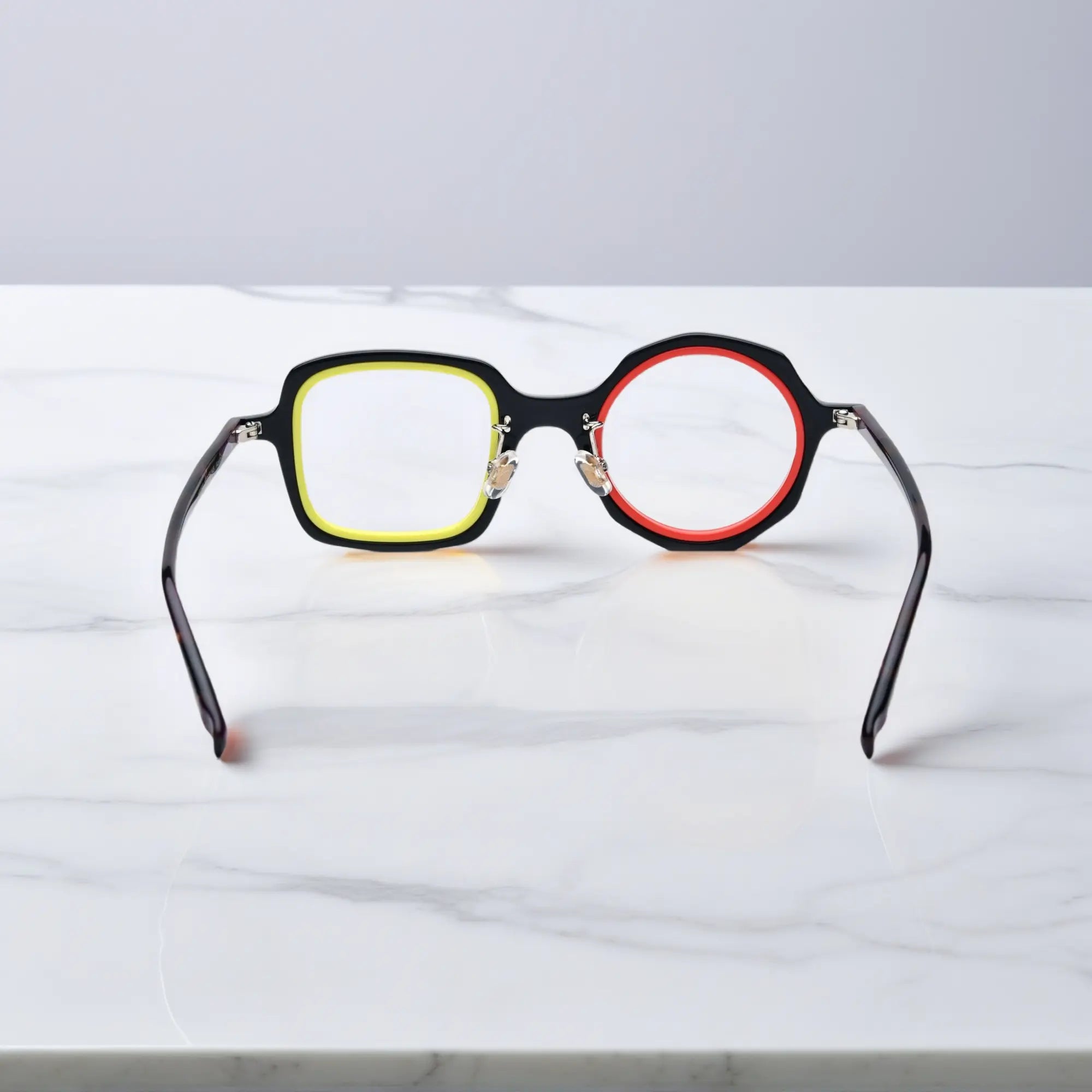 VoyueLens™ geometric eyeglasses in Black Amber color, rear view highlighting acetate structure and temple tips.