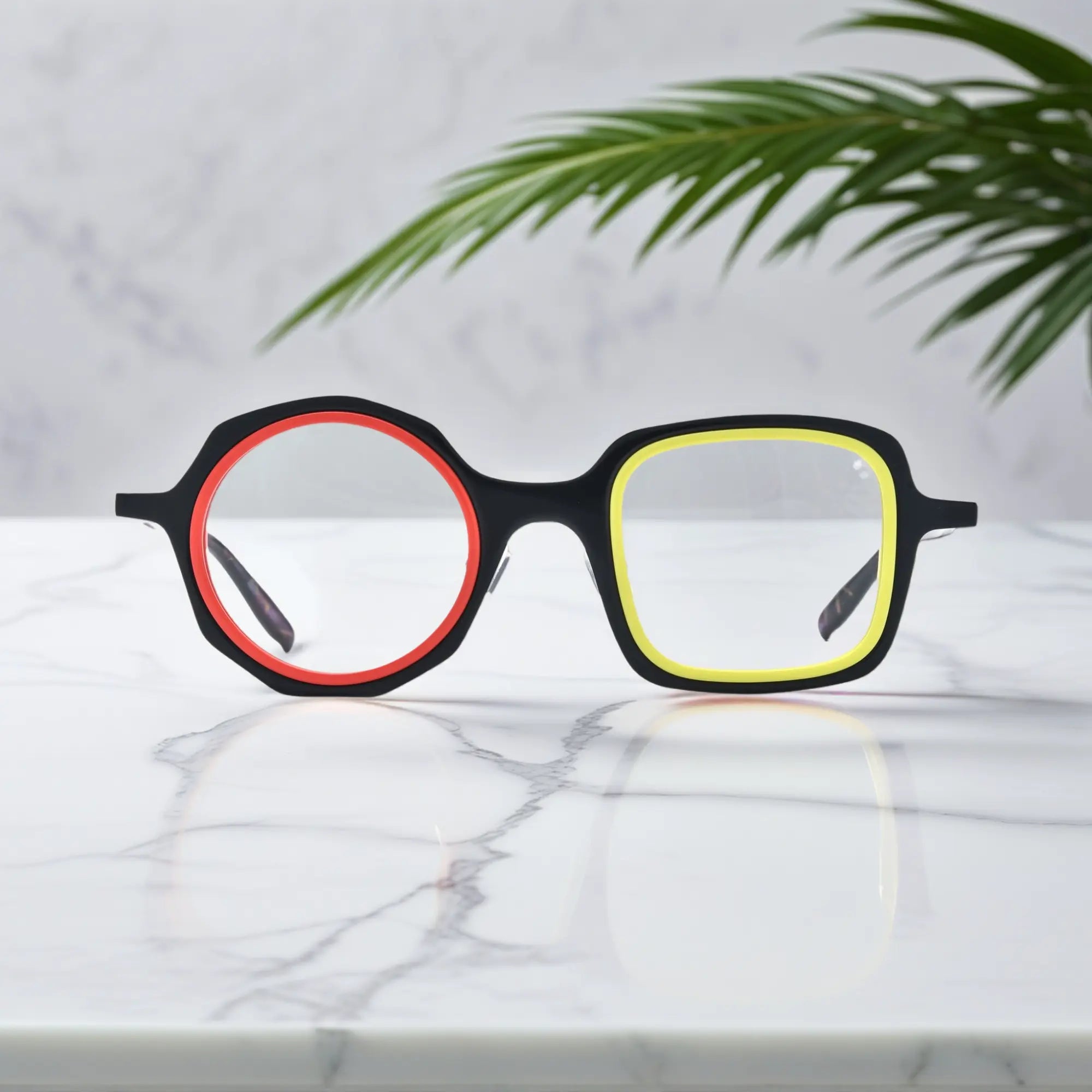 VoyueLens™ geometric eyeglasses in Black Amber color, shown in front view. Features acetate frame and silicone nose pads.