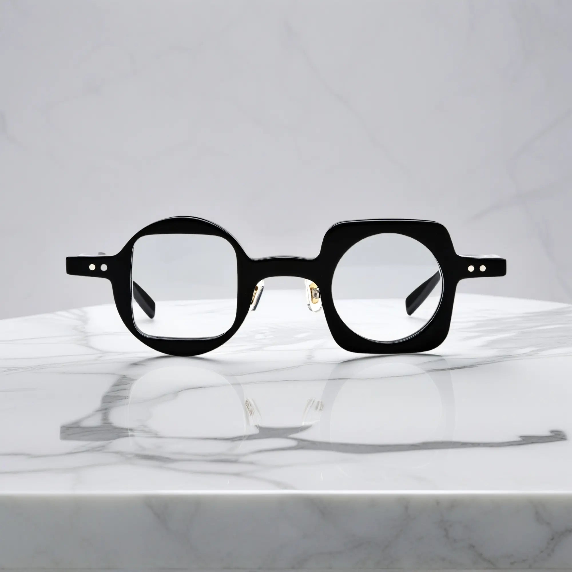 Front view of VoyueLens Designer Series black asymmetrical eyeglasses crafted from polished acetate for everyday unisex wear.