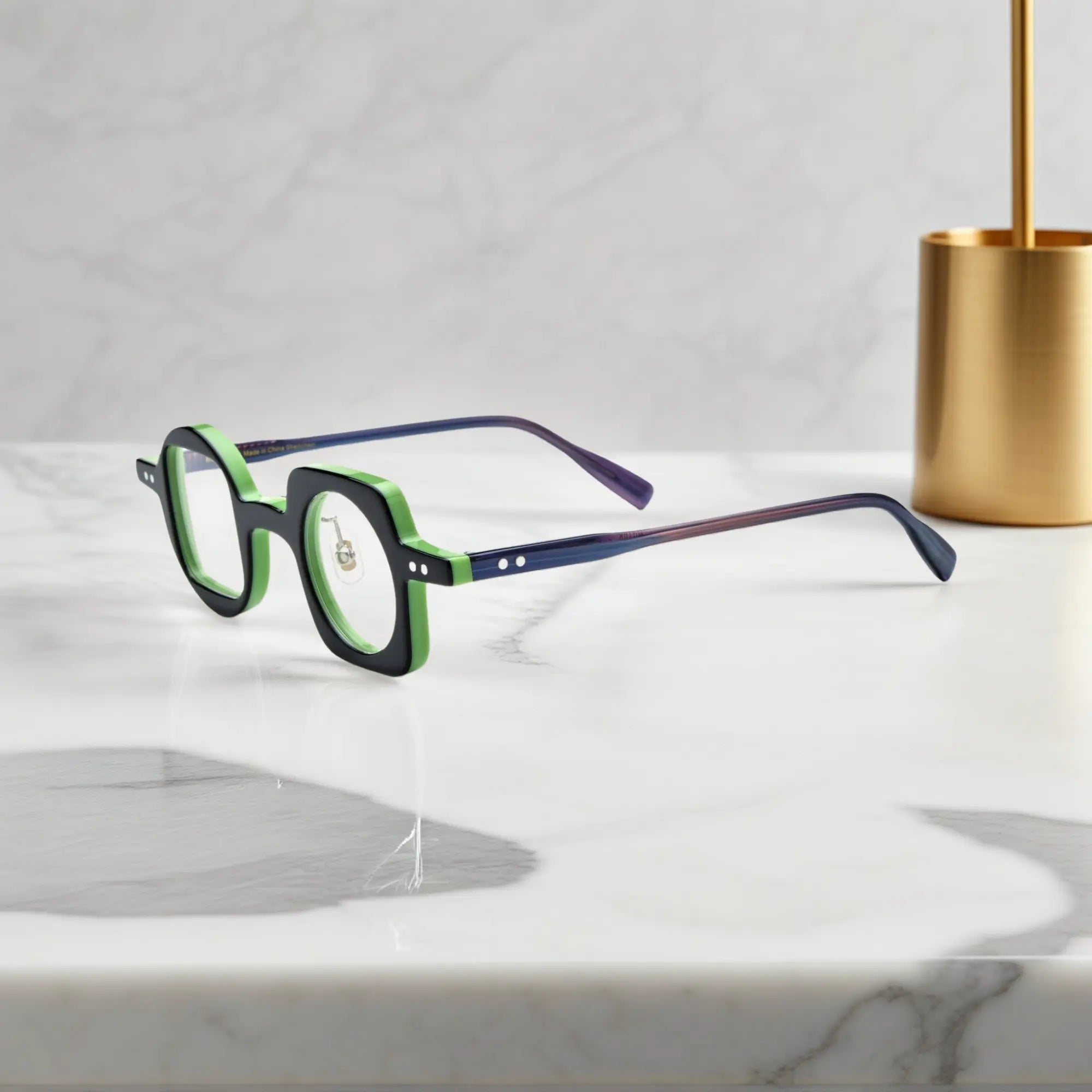 Side profile of VoyueLens black-green asymmetrical eyeglasses highlighting silicone nose pads and strong standard hinges.