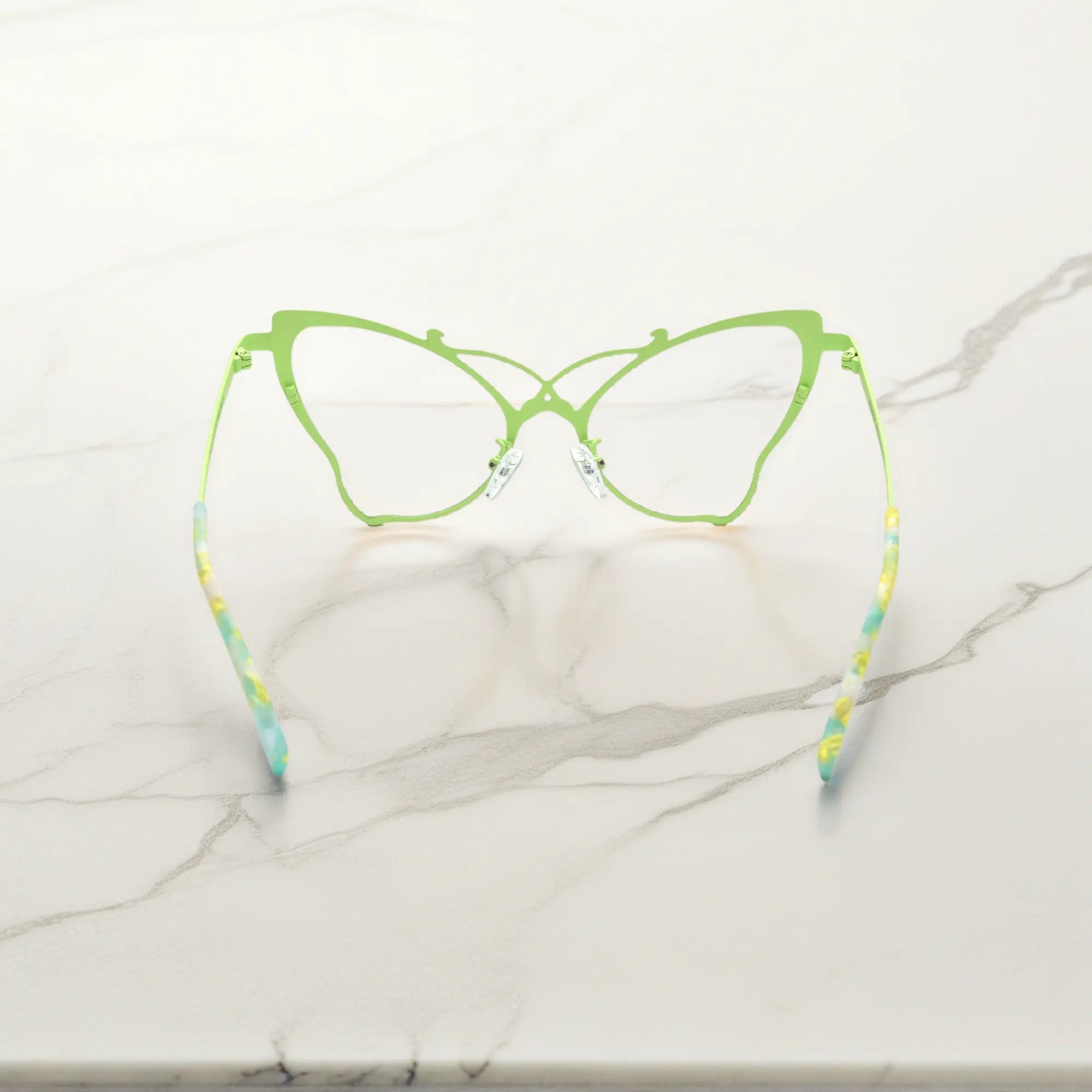 Back of VoyueLens™ VL185862 titanium butterfly eyeglasses in Blue Green – a lightweight, colorful, vintage-inspired, prescription ready frame designed for unique artistic style and everyday comfort.