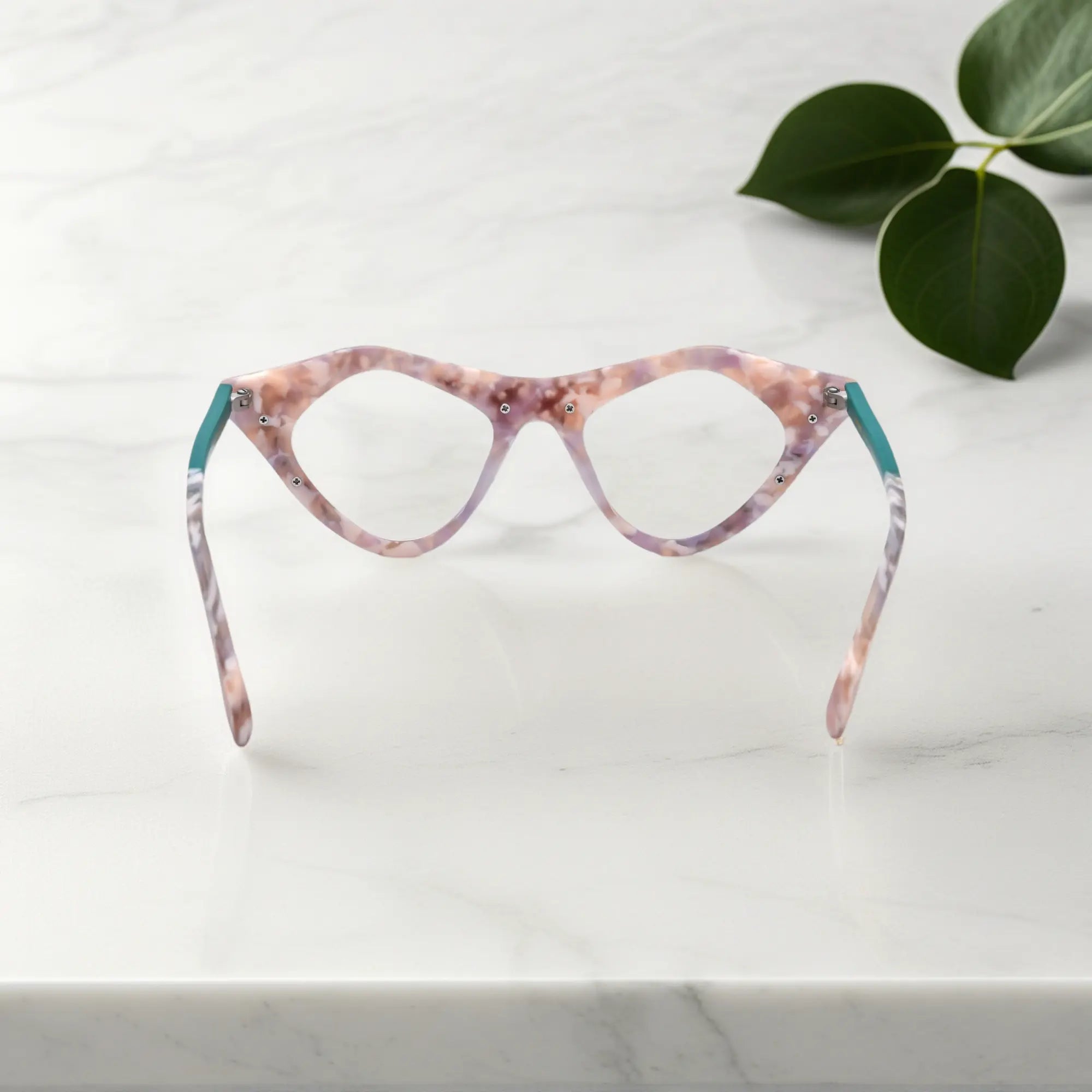 Rear view of Blush Marble VoyueLens™ pixel cat-eye glasses with marbled pastel texture