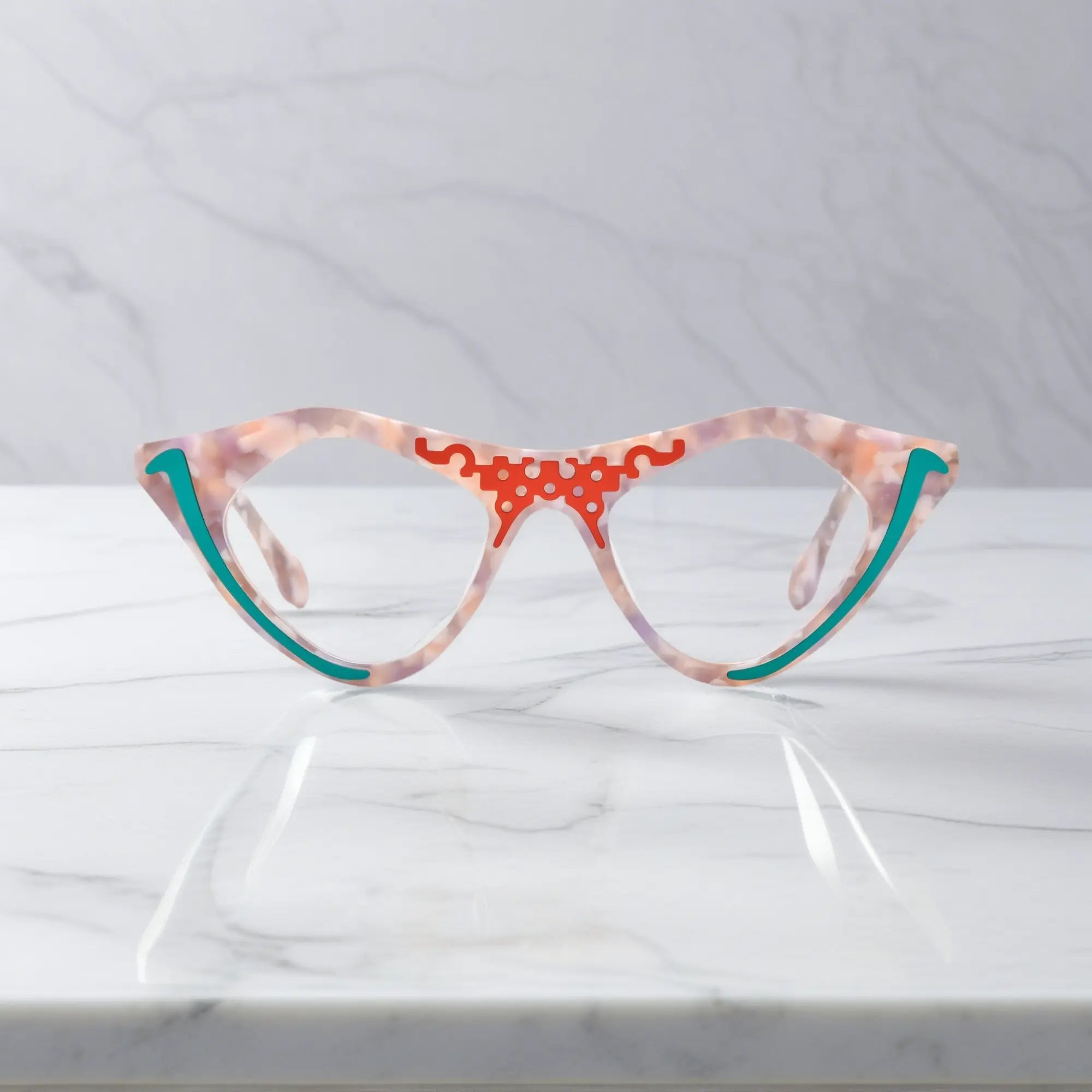 Blush Marble VoyueLens™ pixel cat-eye glasses front view with soft pink marble pattern