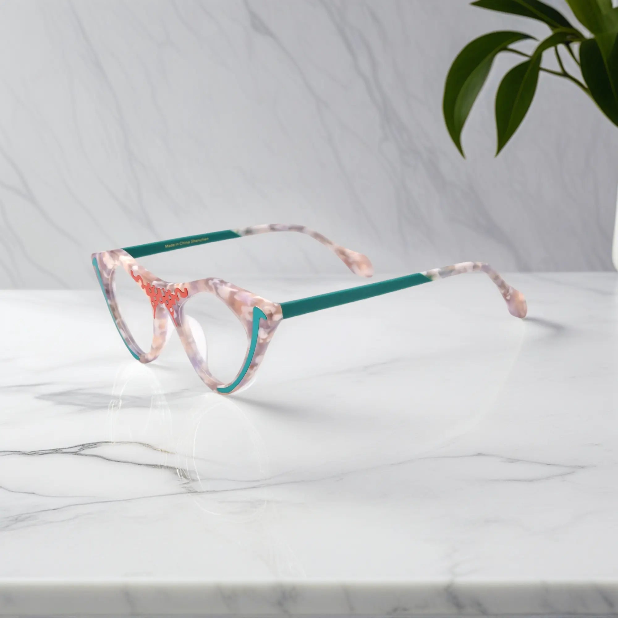 Side view of Blush Marble VoyueLens™ pixel cat-eye glasses in trendy pink finish
