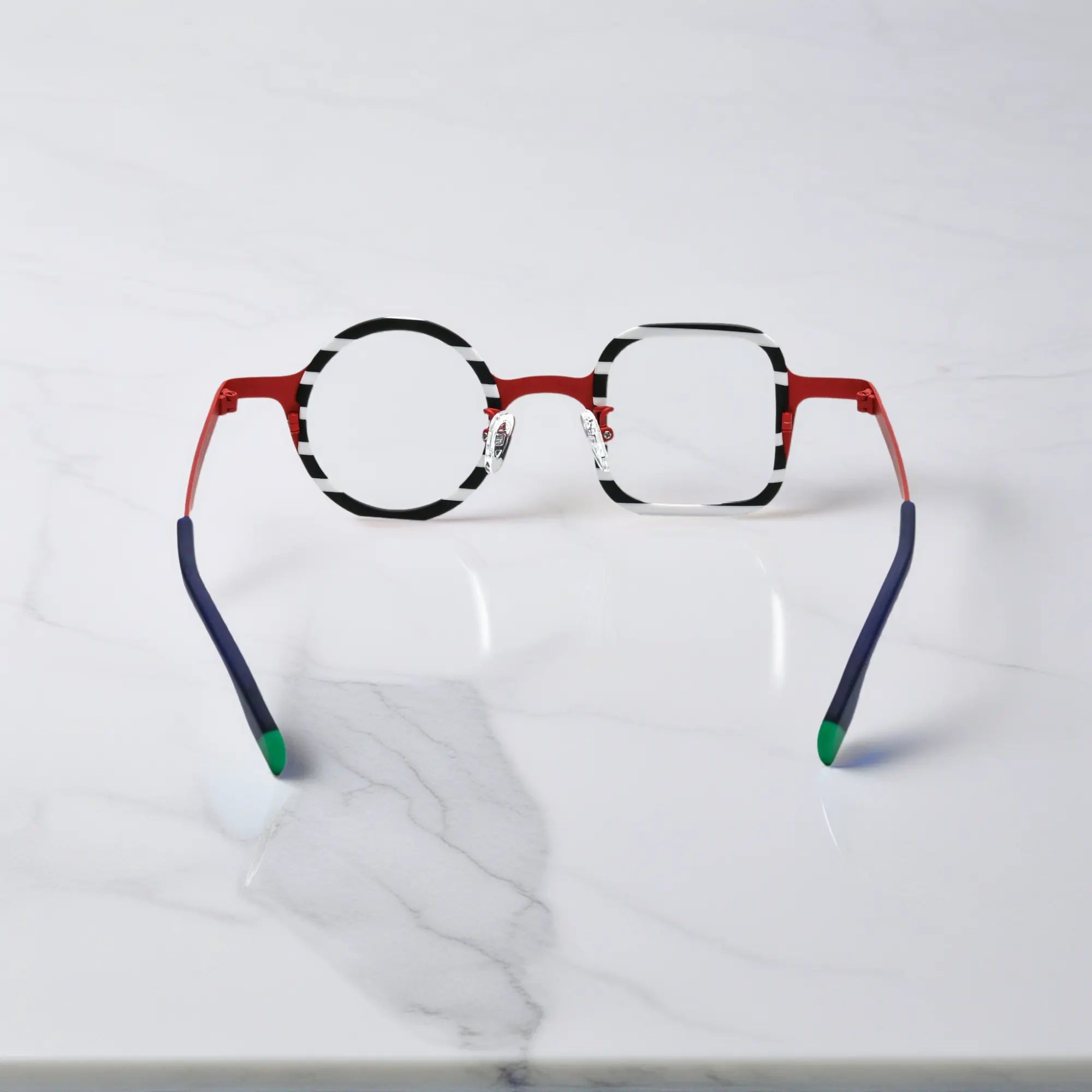 Rear view of dual-shaped Candy Stripe Red frame with ergonomic temple curvature.