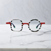 Front view of VoyueLens™ Candy Stripe Red eyeglasses with asymmetrical acetate front and titanium temples.