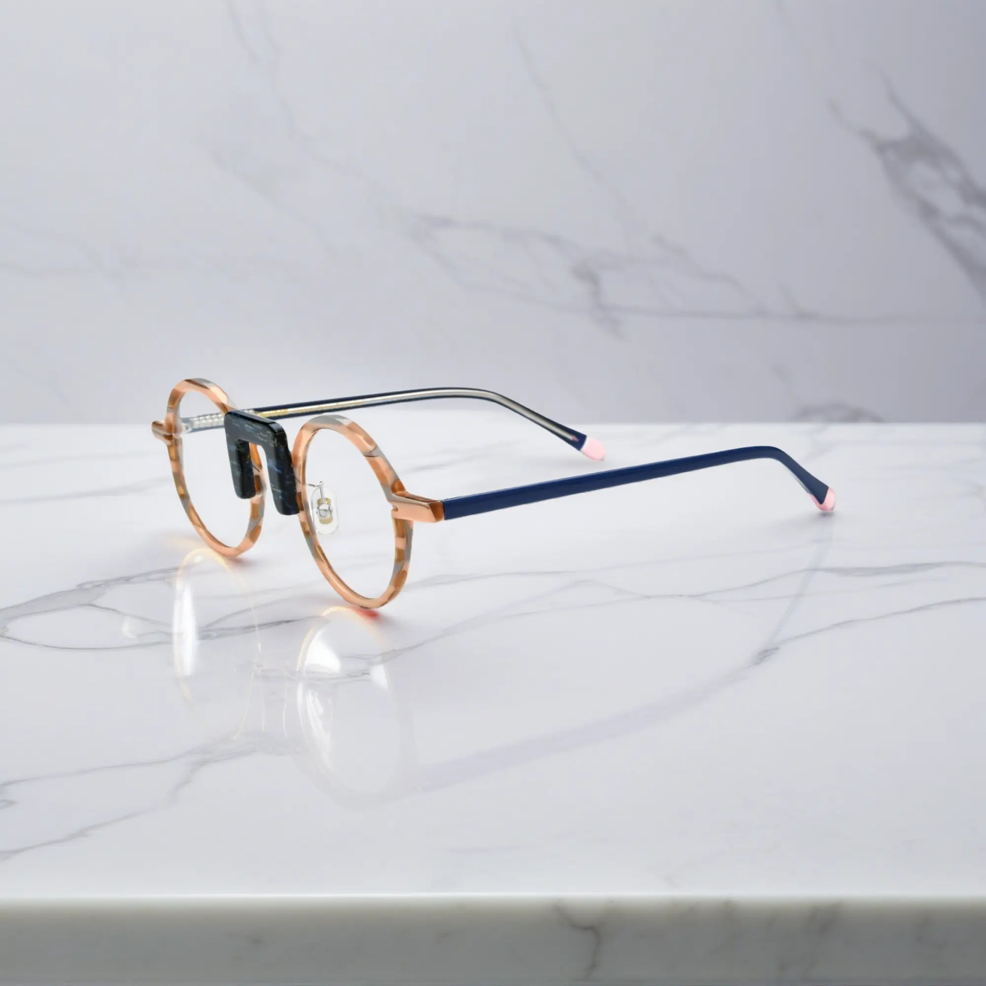 Side look of Caramel Tide round frames with smooth acetate finish