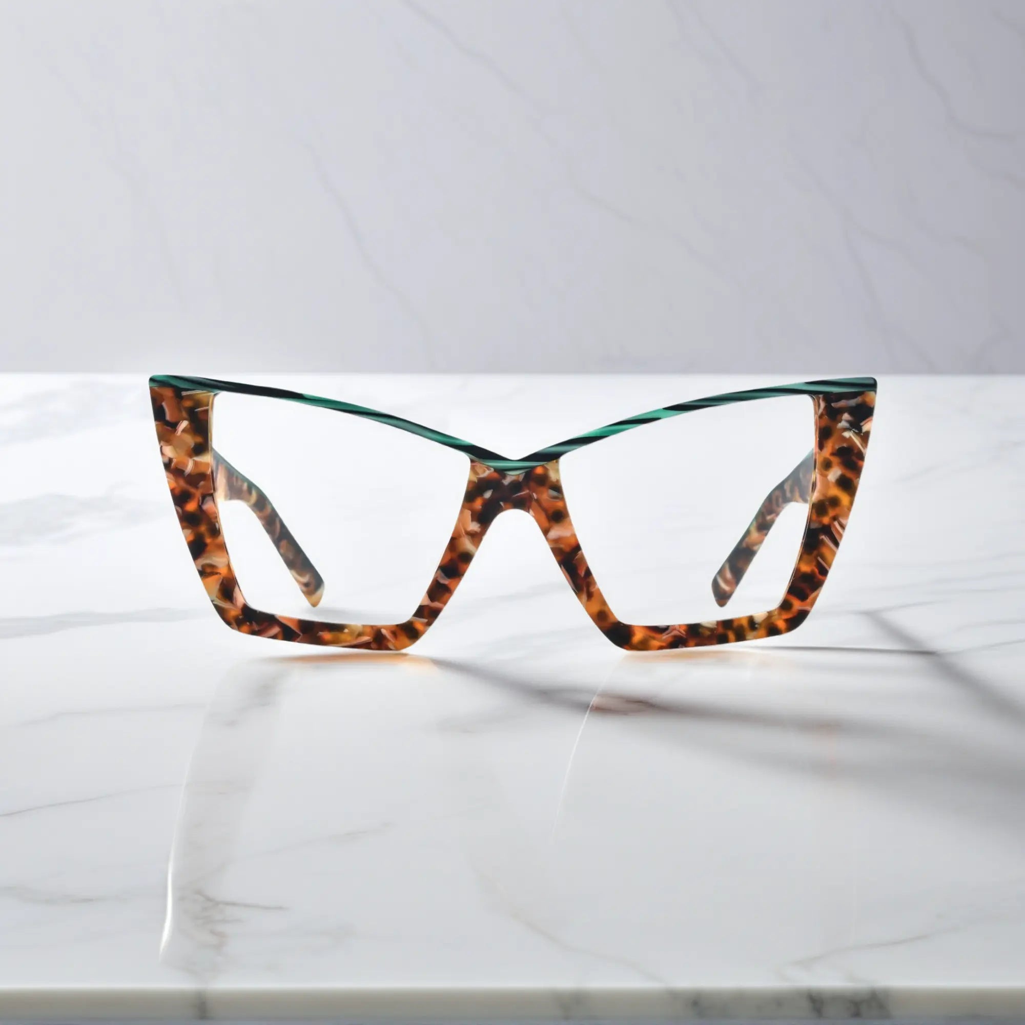 VoyueLens™ oversized cat-eye glasses in emerald tortoise, front view showing green inner rim and butterfly-shaped full-rim acetate frame for women