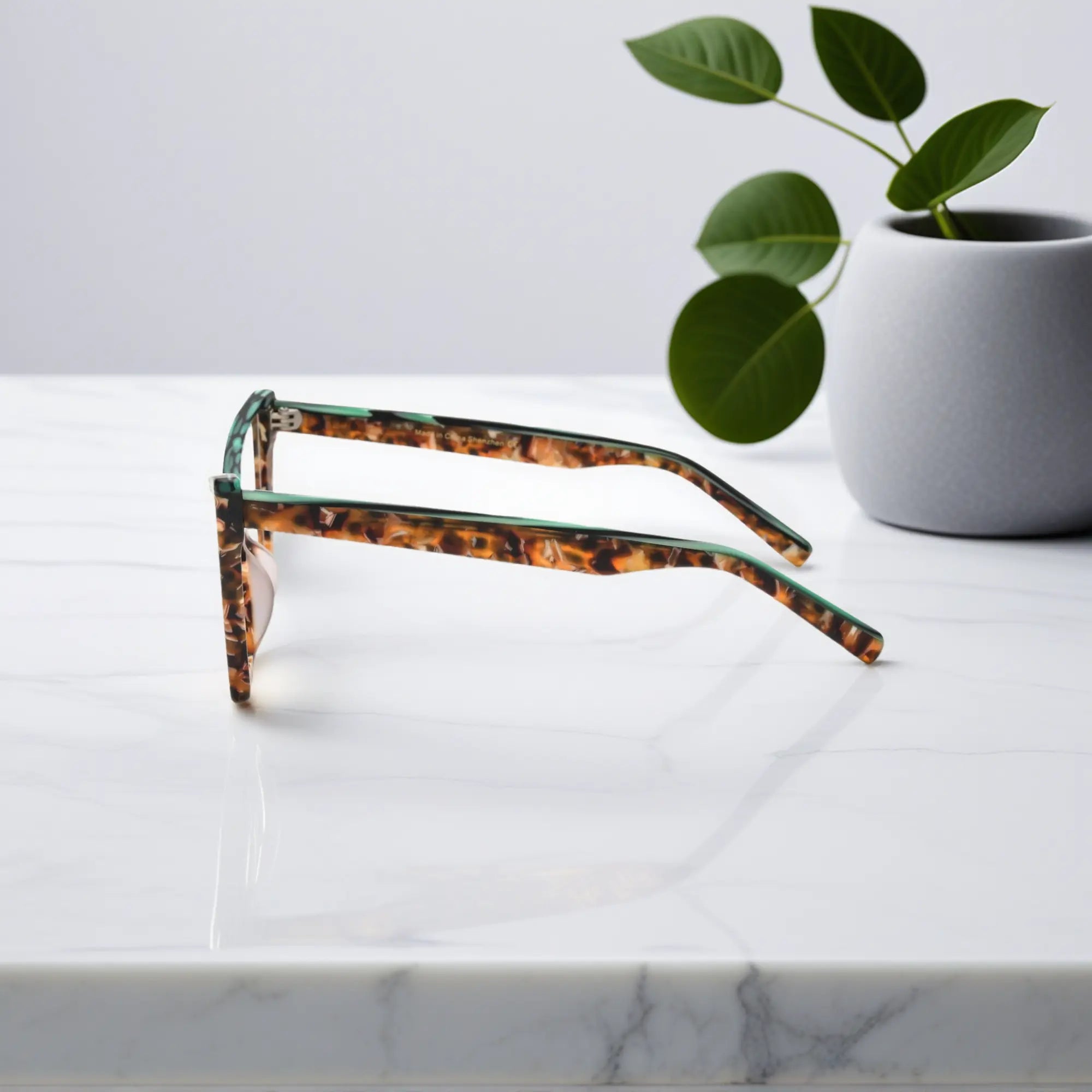 Side view of VoyueLens™ cat-eye glasses in emerald tortoise, highlighting the sleek acetate temples and lightweight design.showing temples