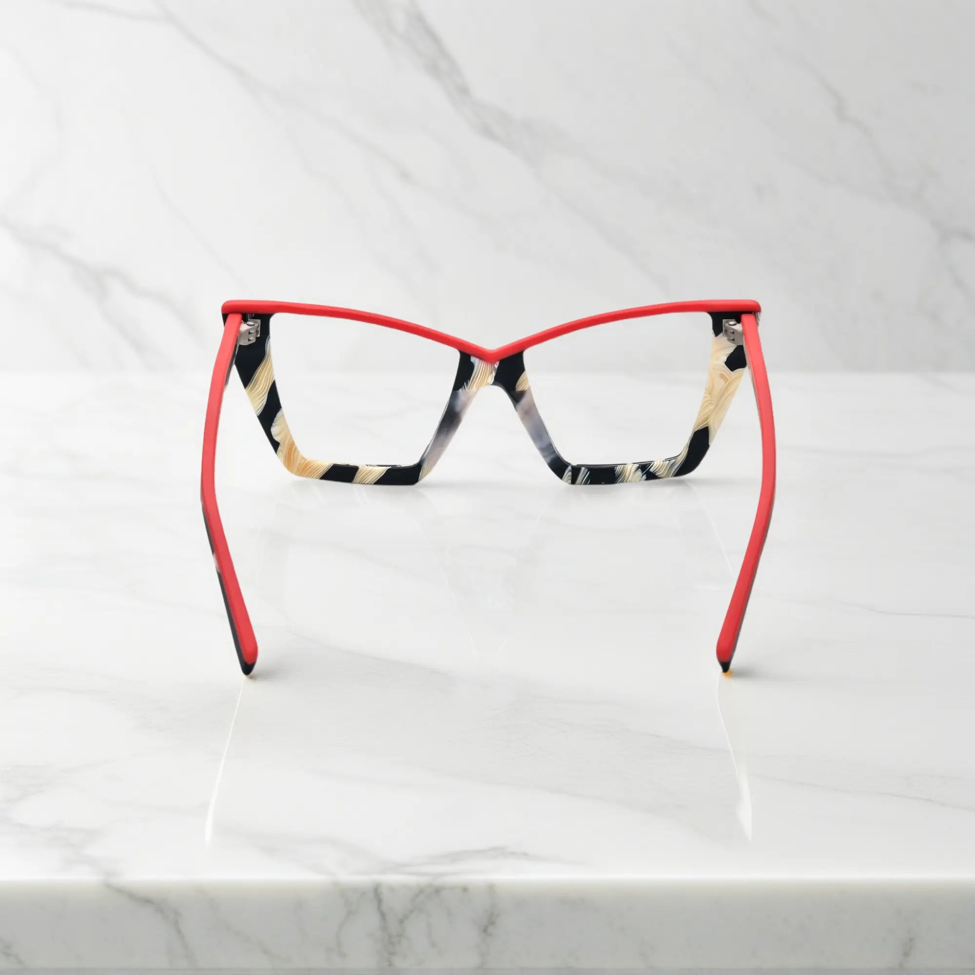 Back view of VoyueLens™ Scarlet Ivory Feather cat-eye frames, showing temple curvature and vibrant acetate finish