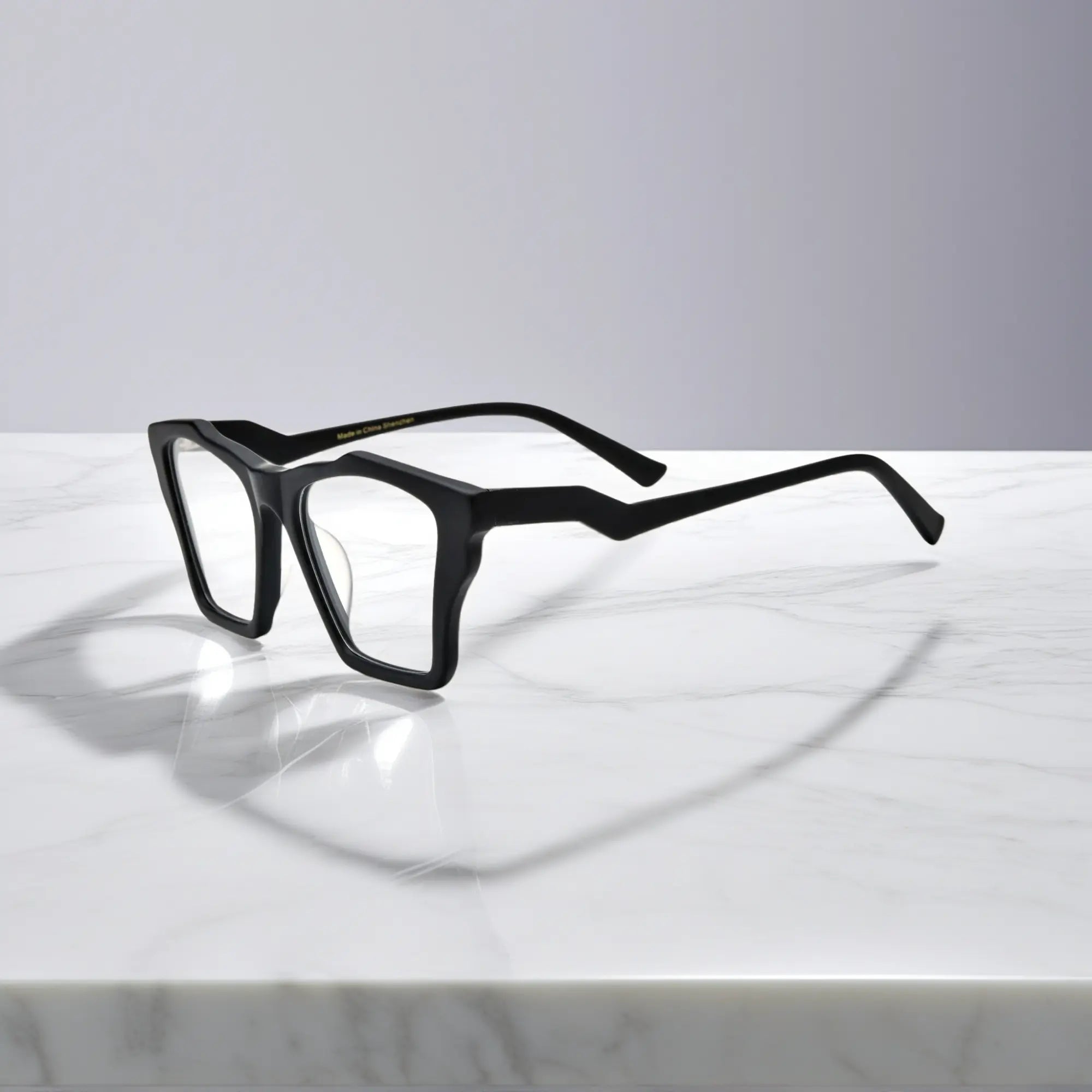 Side profile of VoyueLens™ Charcoal Black glasses, highlighting solid matte black with subtle gray temples and ergonomic acetate arms.