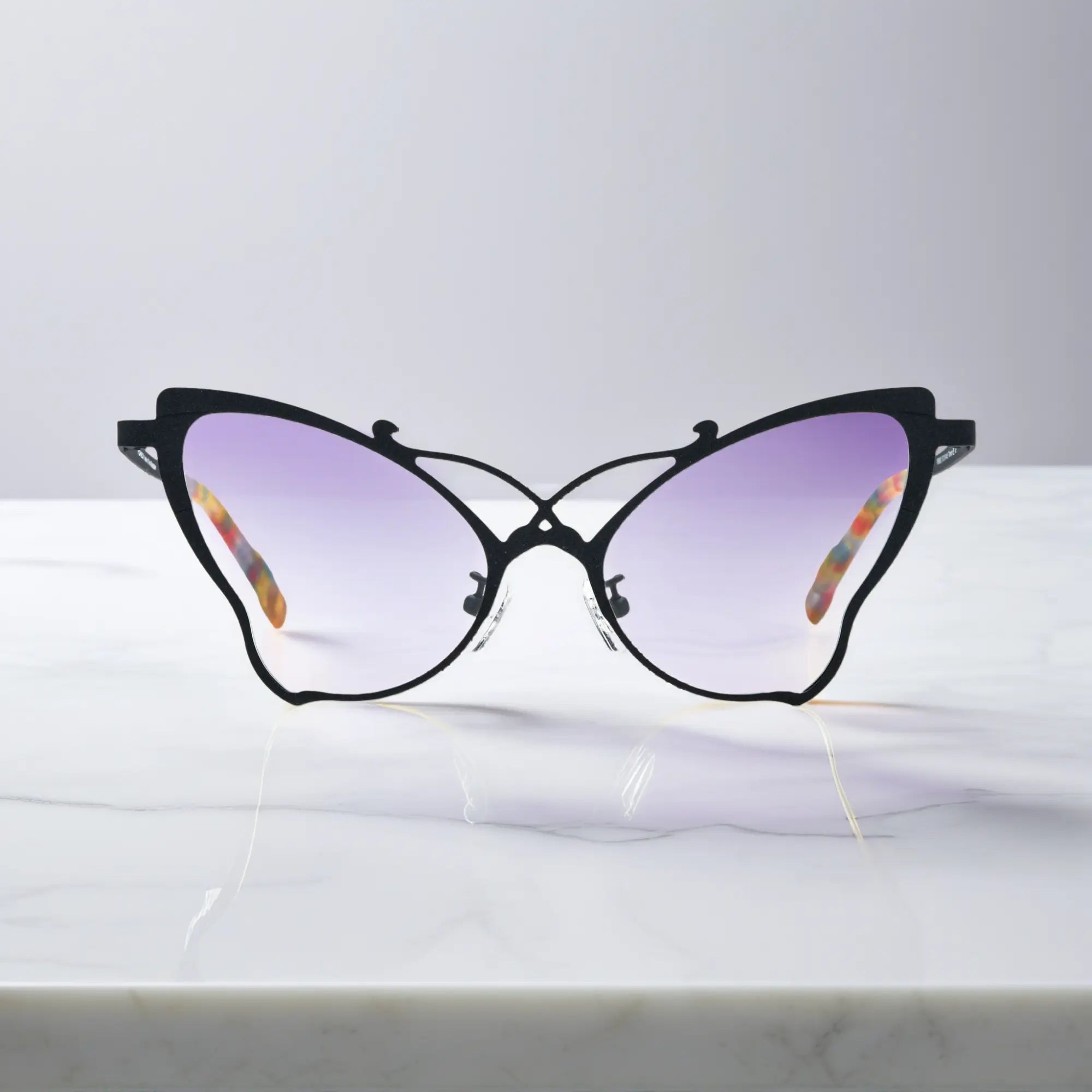 Front of VoyueLens™ VL185862 titanium butterfly eyeglasses in Charcoal Black – a lightweight, colorful, vintage-inspired, prescription ready frame designed for unique artistic style and everyday comfort.