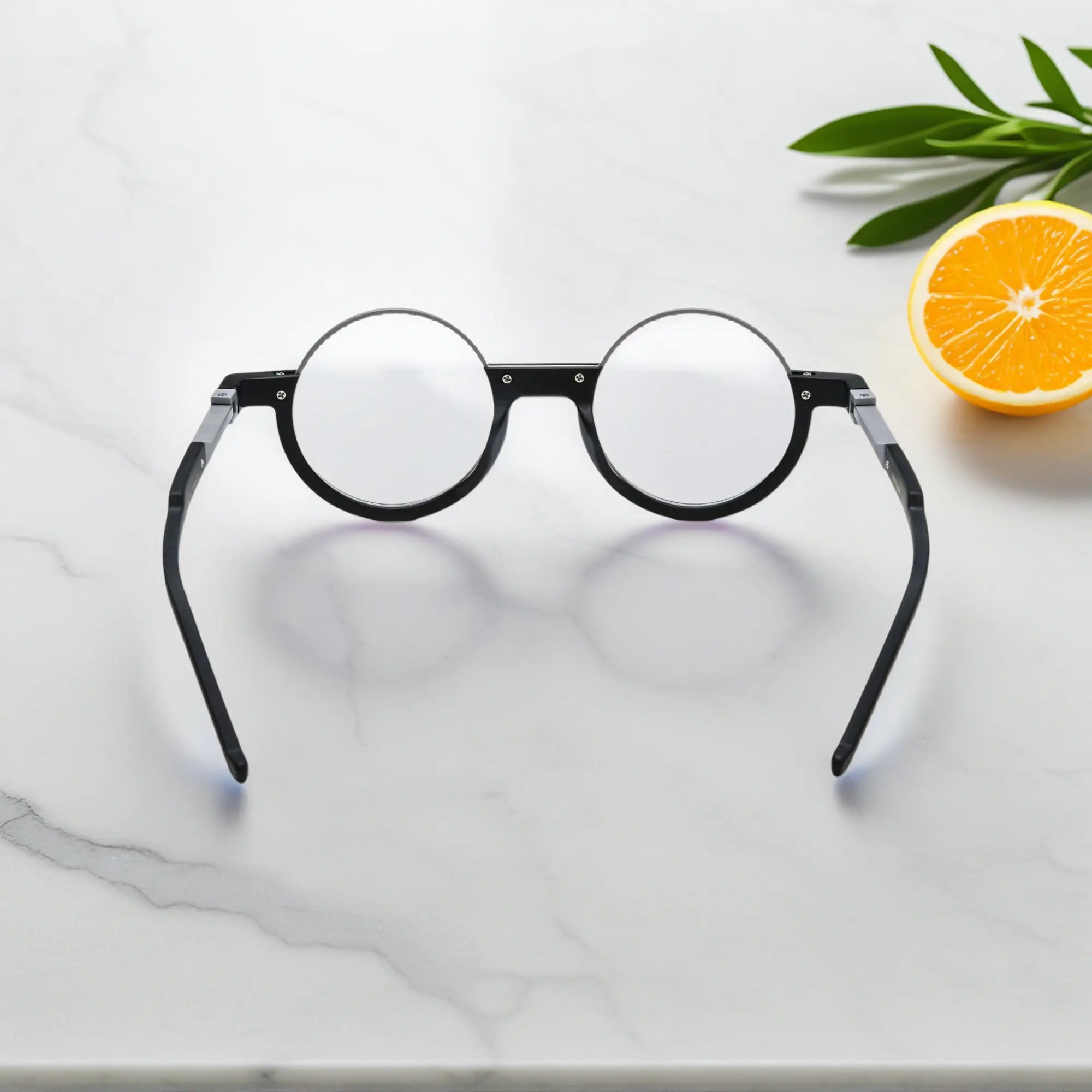 Rear view of Charcoal Silver eyeglasses showcasing high-polish silver core and matte black contrast.