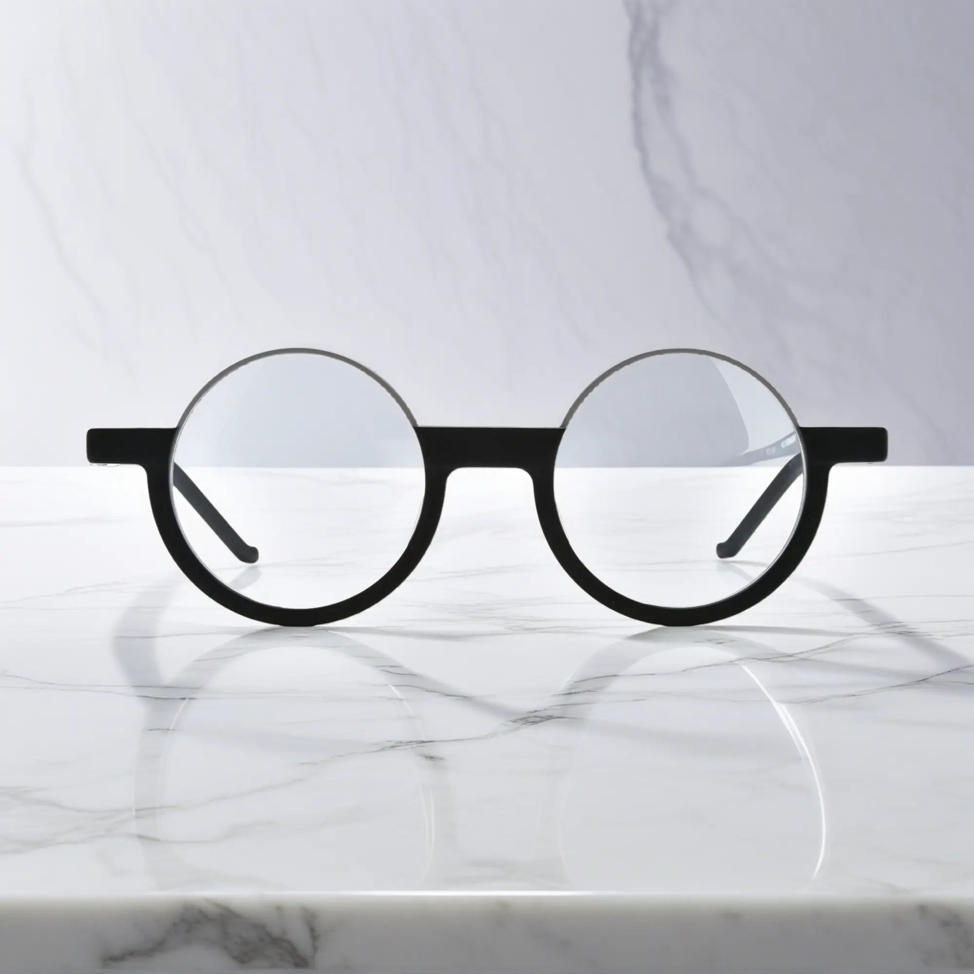 Front view of VoyueLens™ Charcoal Silver eyeglasses featuring a sleek matte black frame and minimalist silver detail.