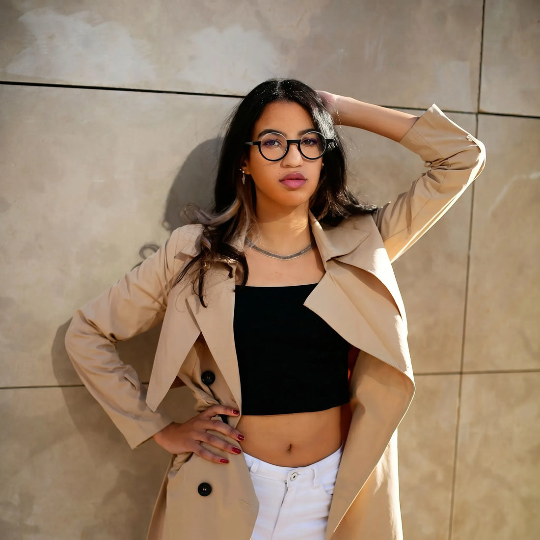 Model wearing sleek Charcoal Silver VoyueLens™ eyeglasses with understated elegance and modern appeal.