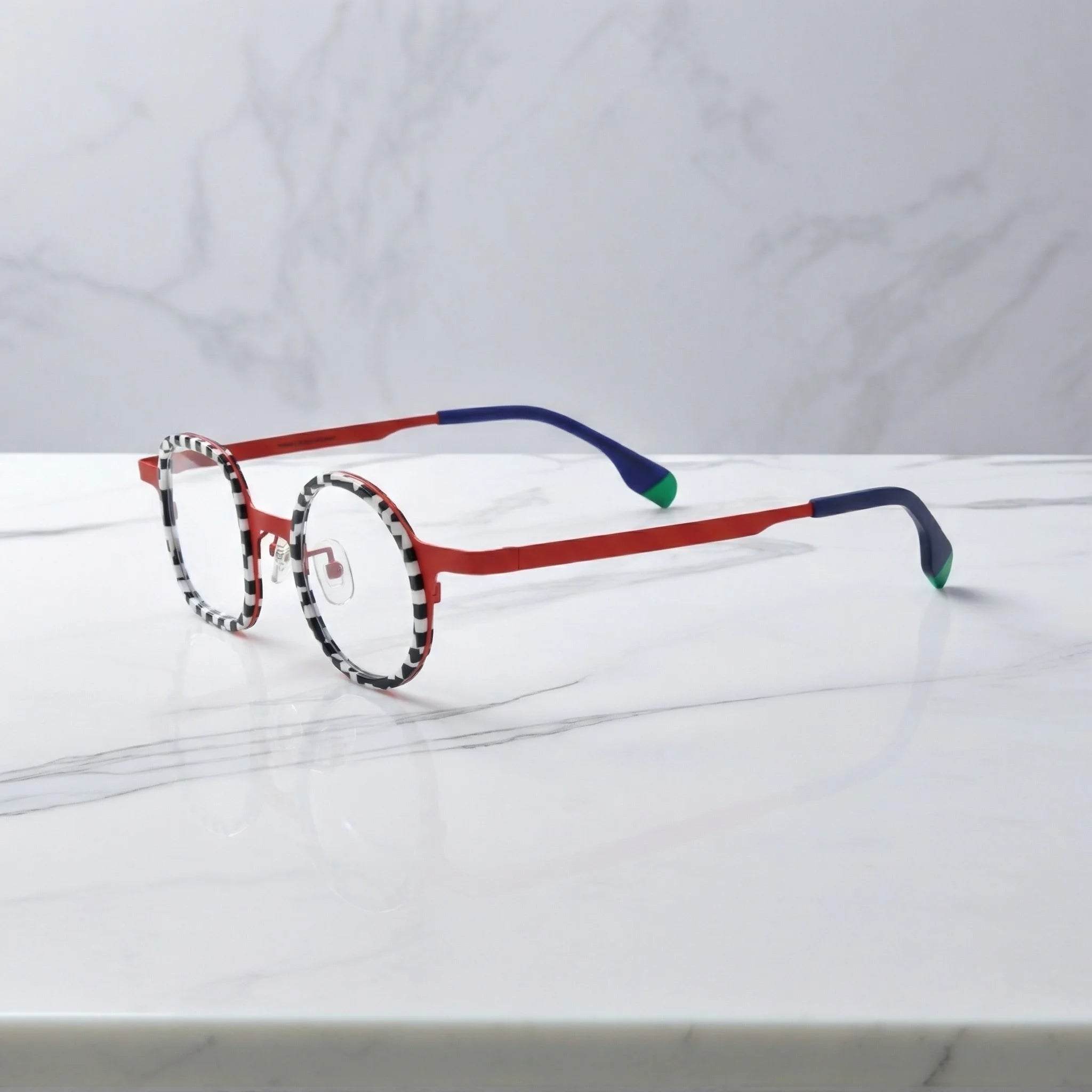 Side profile of VoyueLens Checker Clash Red eyeglasses featuring ultra-light titanium temples with blue and green tip accents, designed by BARLEDEAR.