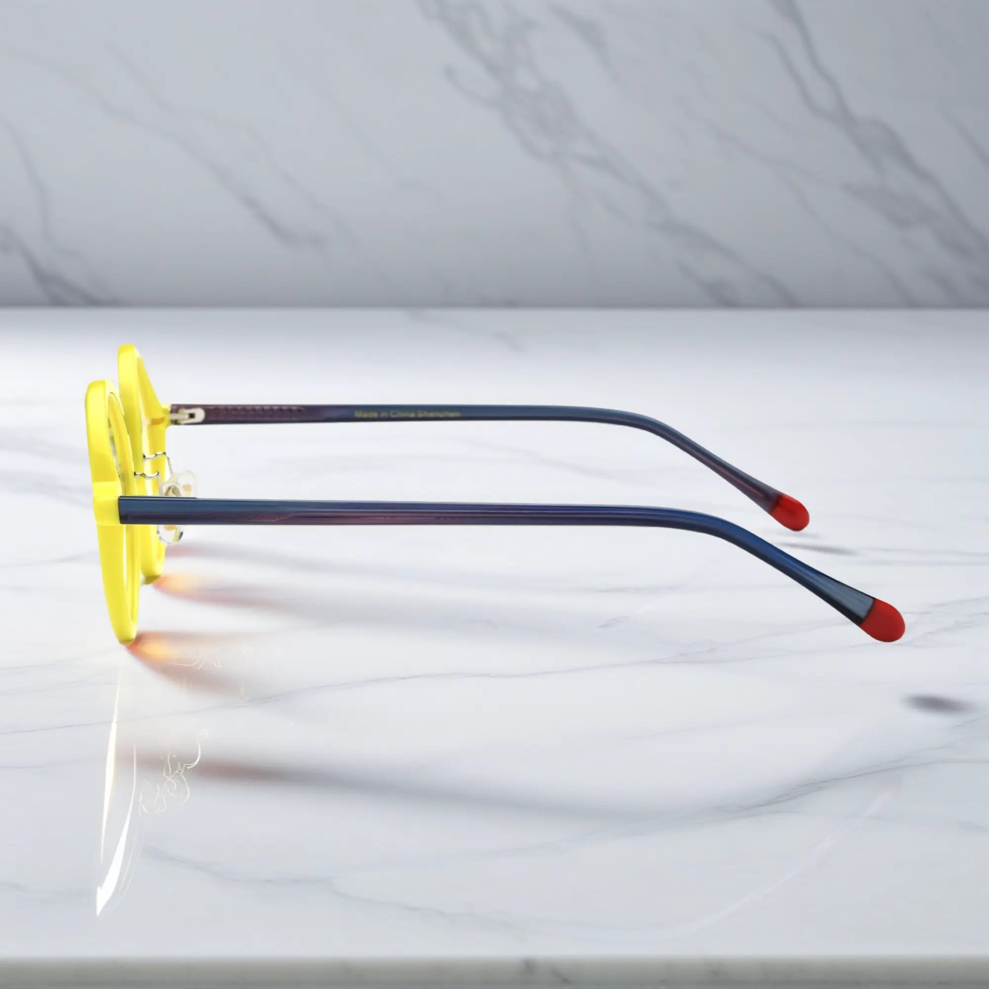 Side profile showing navy temples of Checker Yellow NeoPop eyeglasses