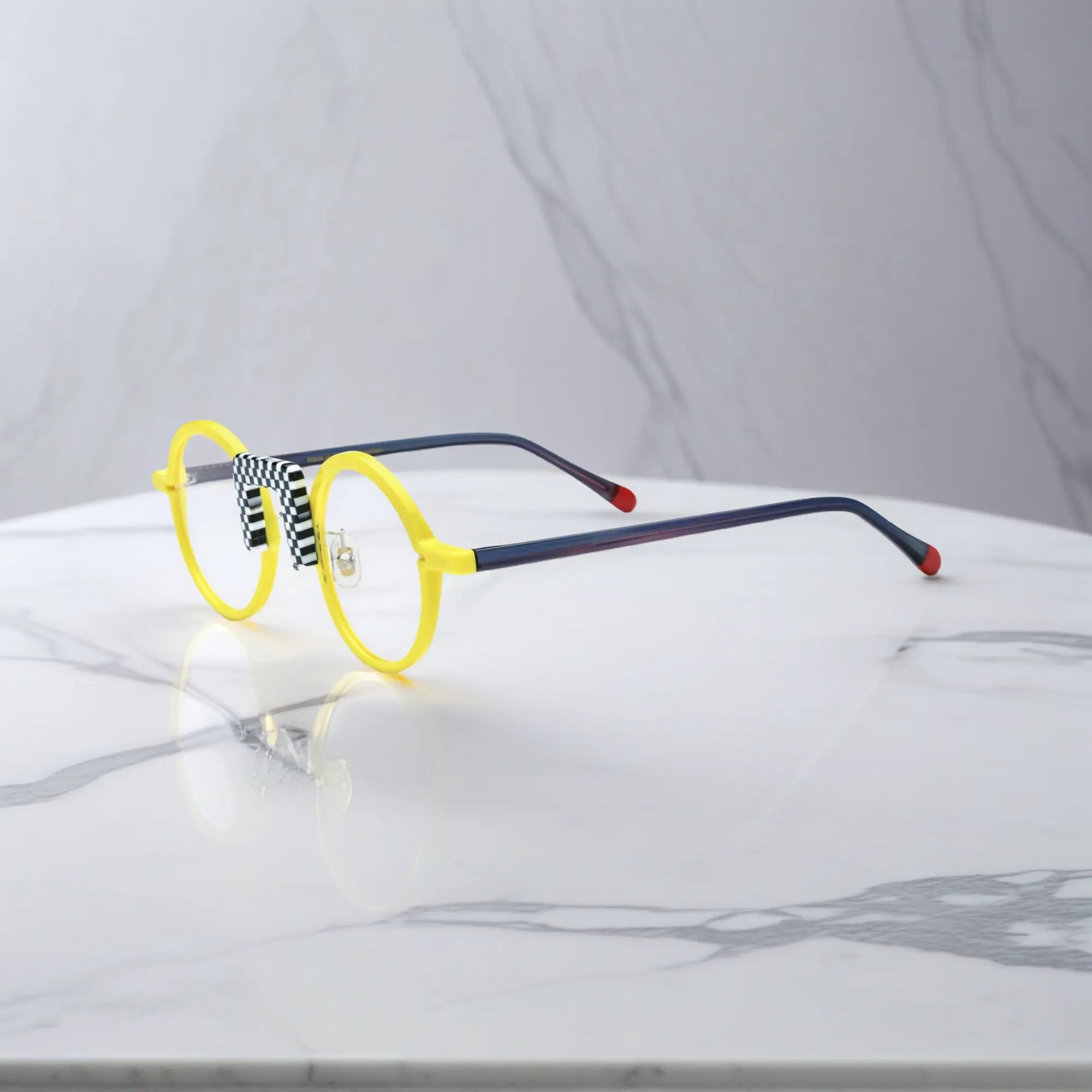 Side profile showing navy temples of Checker Yellow NeoPop eyeglasses
