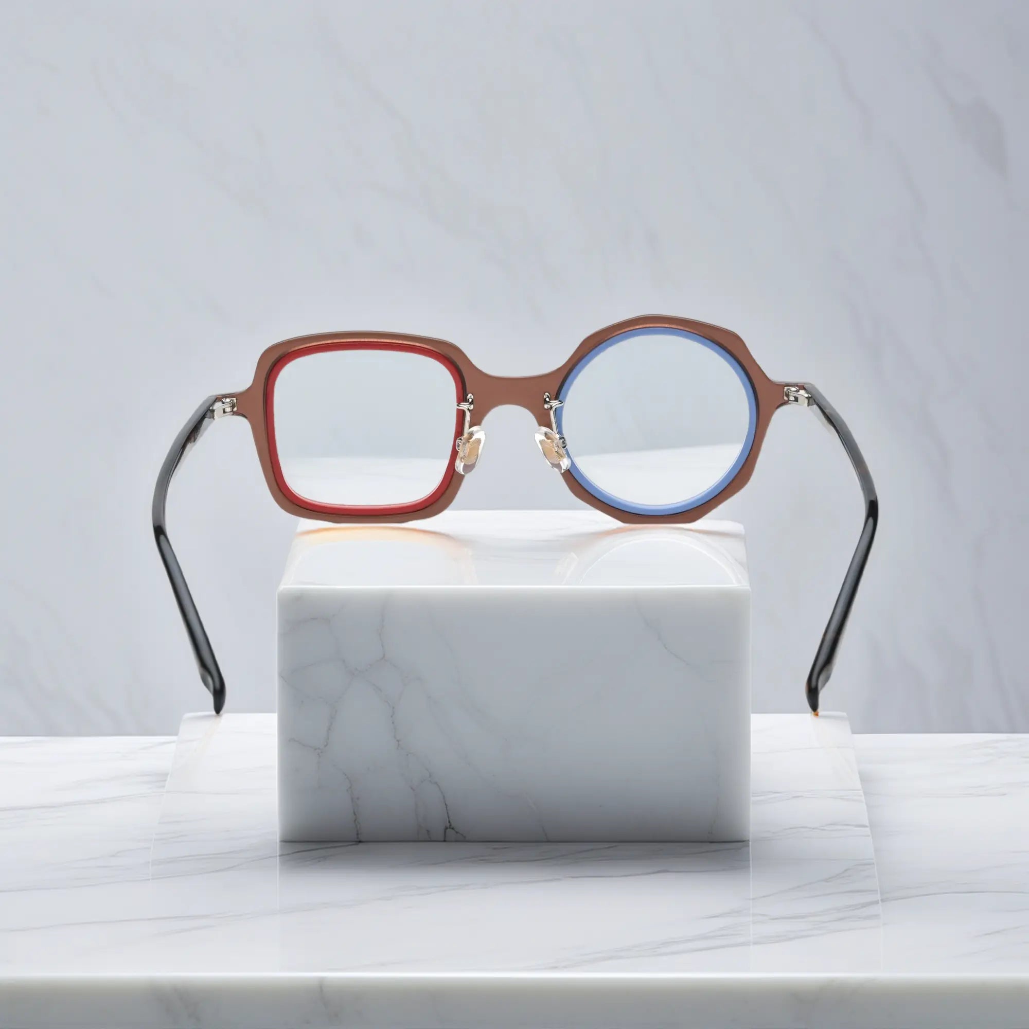 VoyueLens™ geometric eyeglasses in Chestnut Blue color, rear view highlighting acetate structure and temple tips.