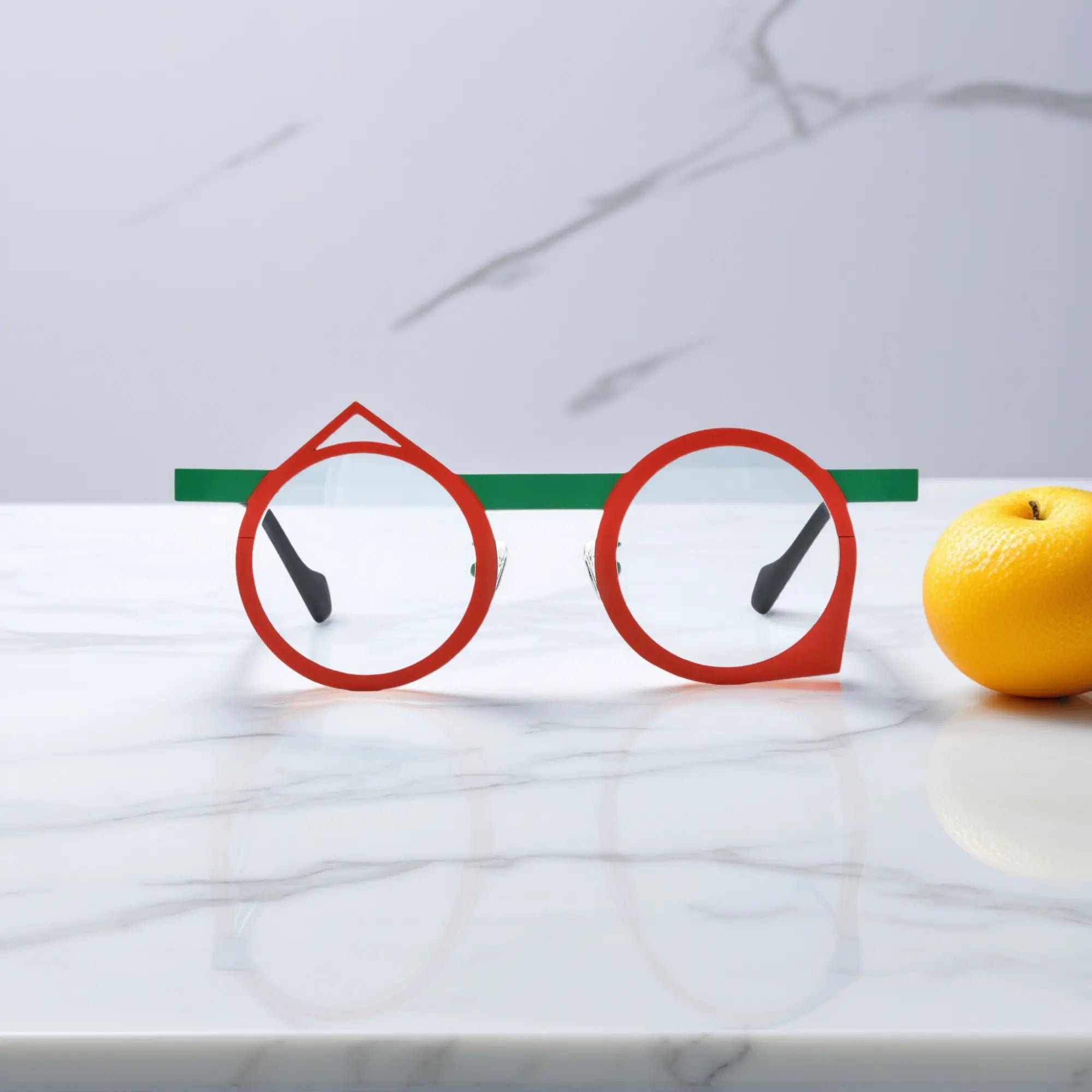 Front view of VoyueLens™ VL185801 geometric eyeglasses with a red-green Chili Emerald titanium frame, featuring a bold retro polygonal shape.