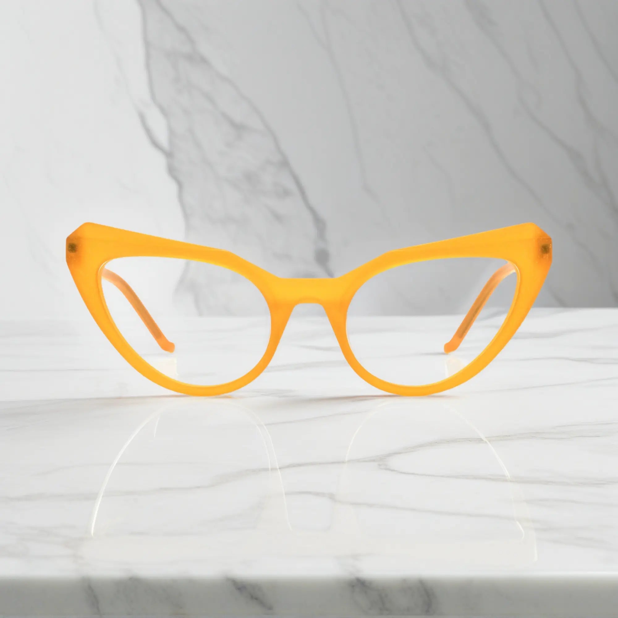 Front view of VoyueLens™ Citrus Amber butterfly eyeglasses with warm orange tones and oversized acetate frame.