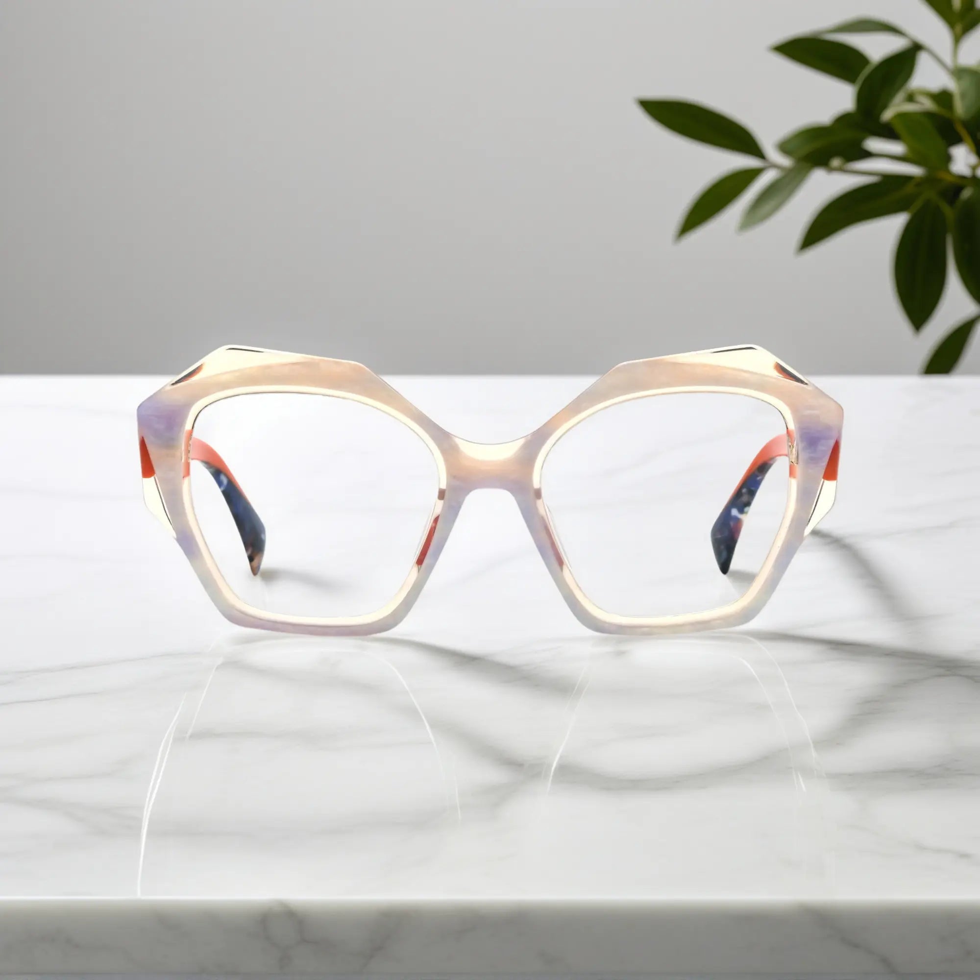 Energetic front view of Citrus Punch eyeglasses with translucent pearl front and orange arms.