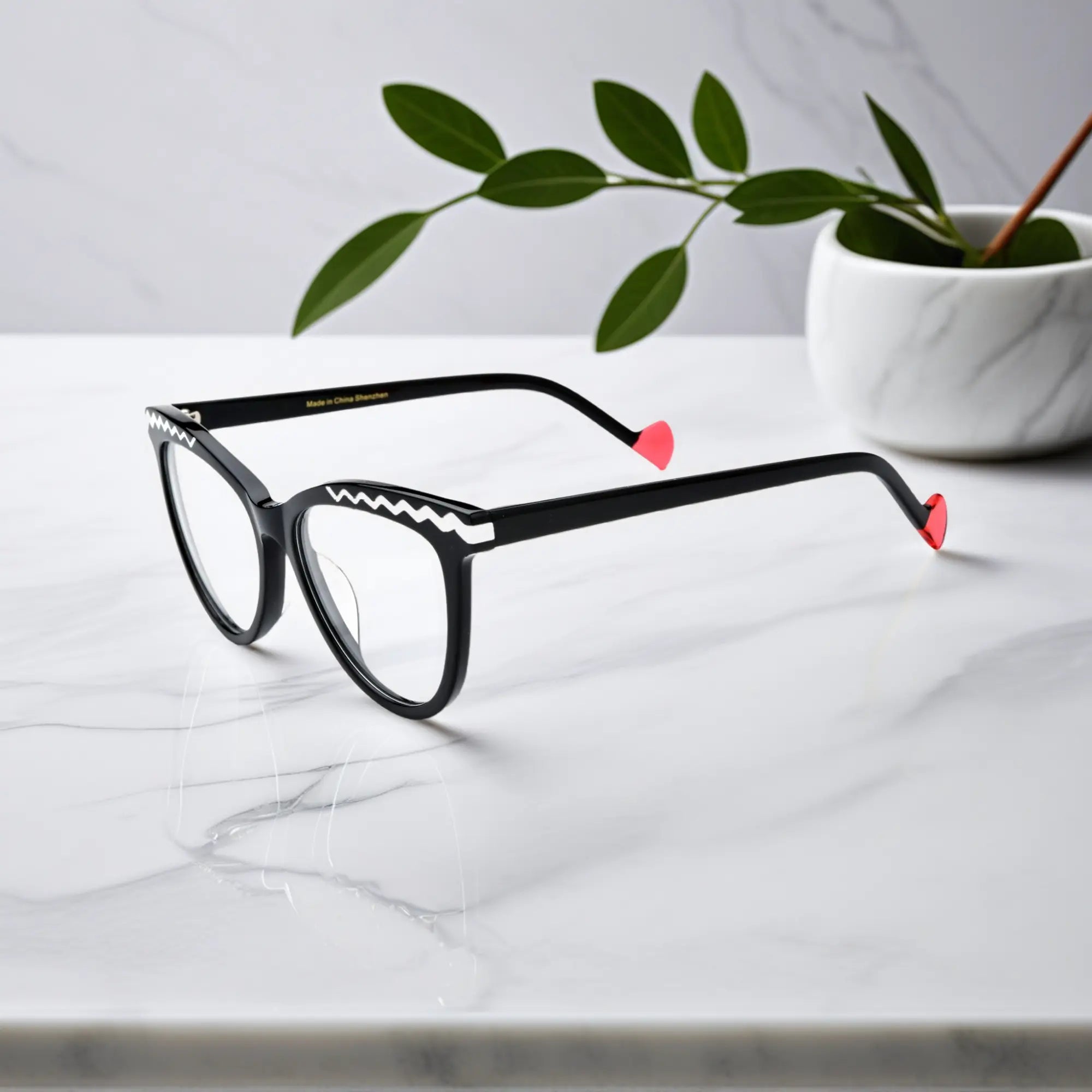 Side profile of VoyueLens VL19362 in classic black with red temple ends
