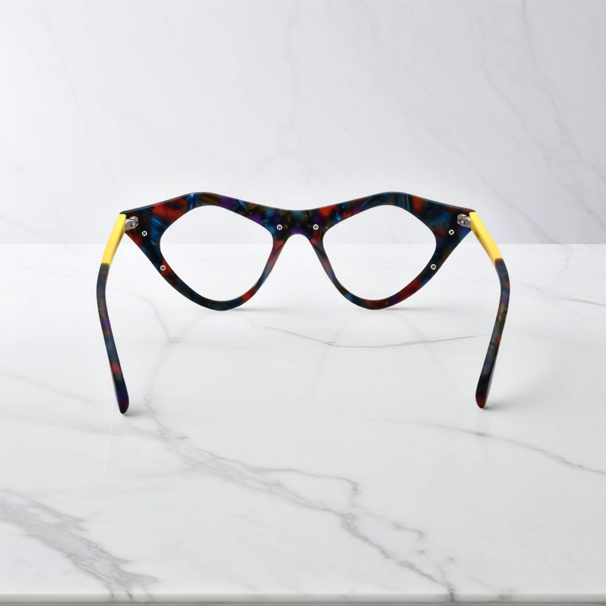 Rear view of Color Burst VoyueLens™ pixel cat-eye eyewear in matte rainbow acetate